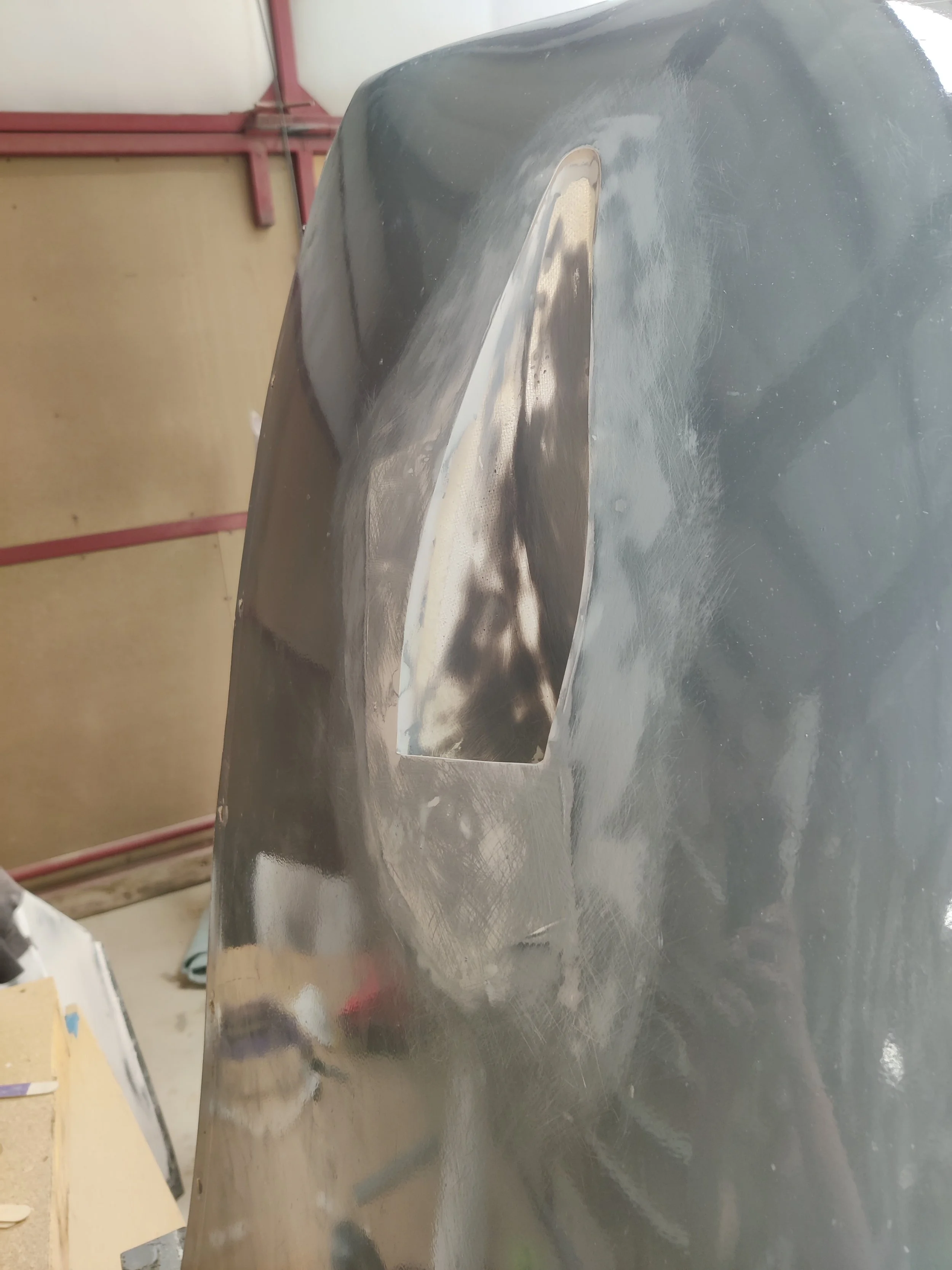 The new scoop installed and smoothly faired into the cowl