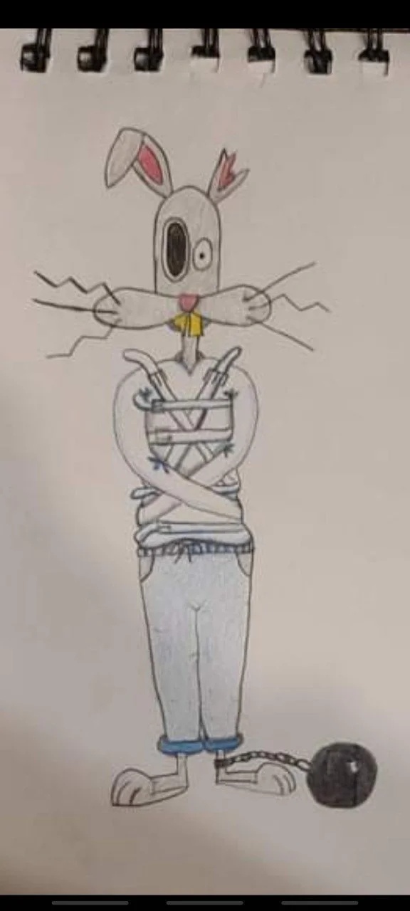 A drawing of a cartoon bunny with one eye and long whiskers, wearing a striped shirt and jeans, with a ball and chain attached to its foot.