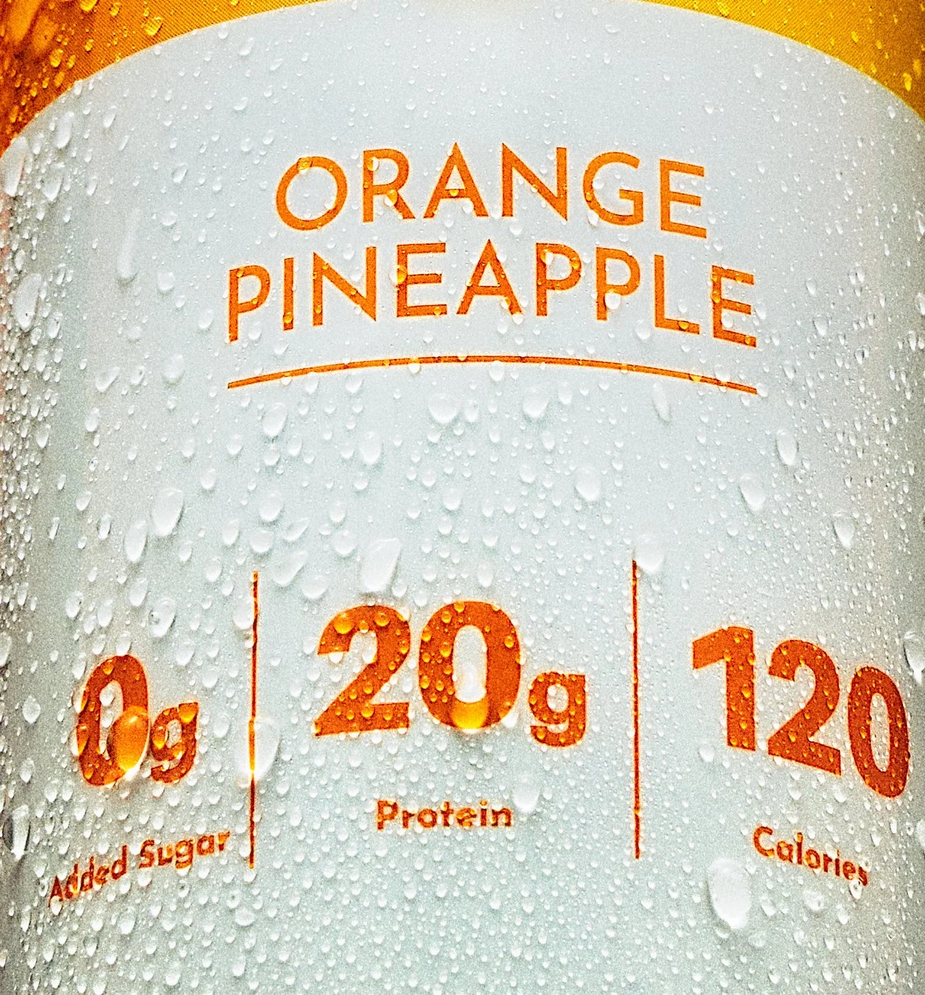 Macro detail by NAJ Captured of Just Ingredients Clear Protein's Orange Pineapple flavor and nutrition facts — 0g added sugar, 20g protein, 120 calories.