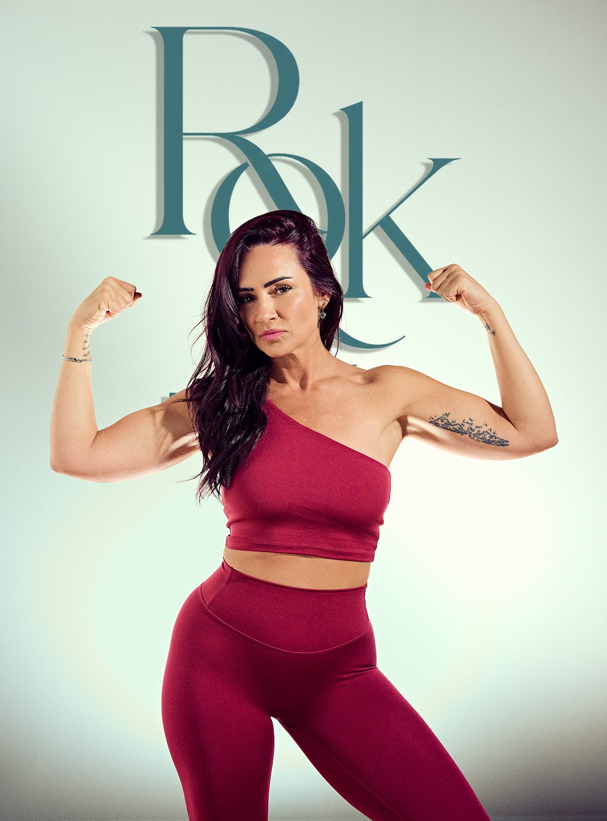Long Island Pilates instructor flexing during a fitness branding photoshoot showcasing strength, confidence, and wellness photography by NAJ Captured