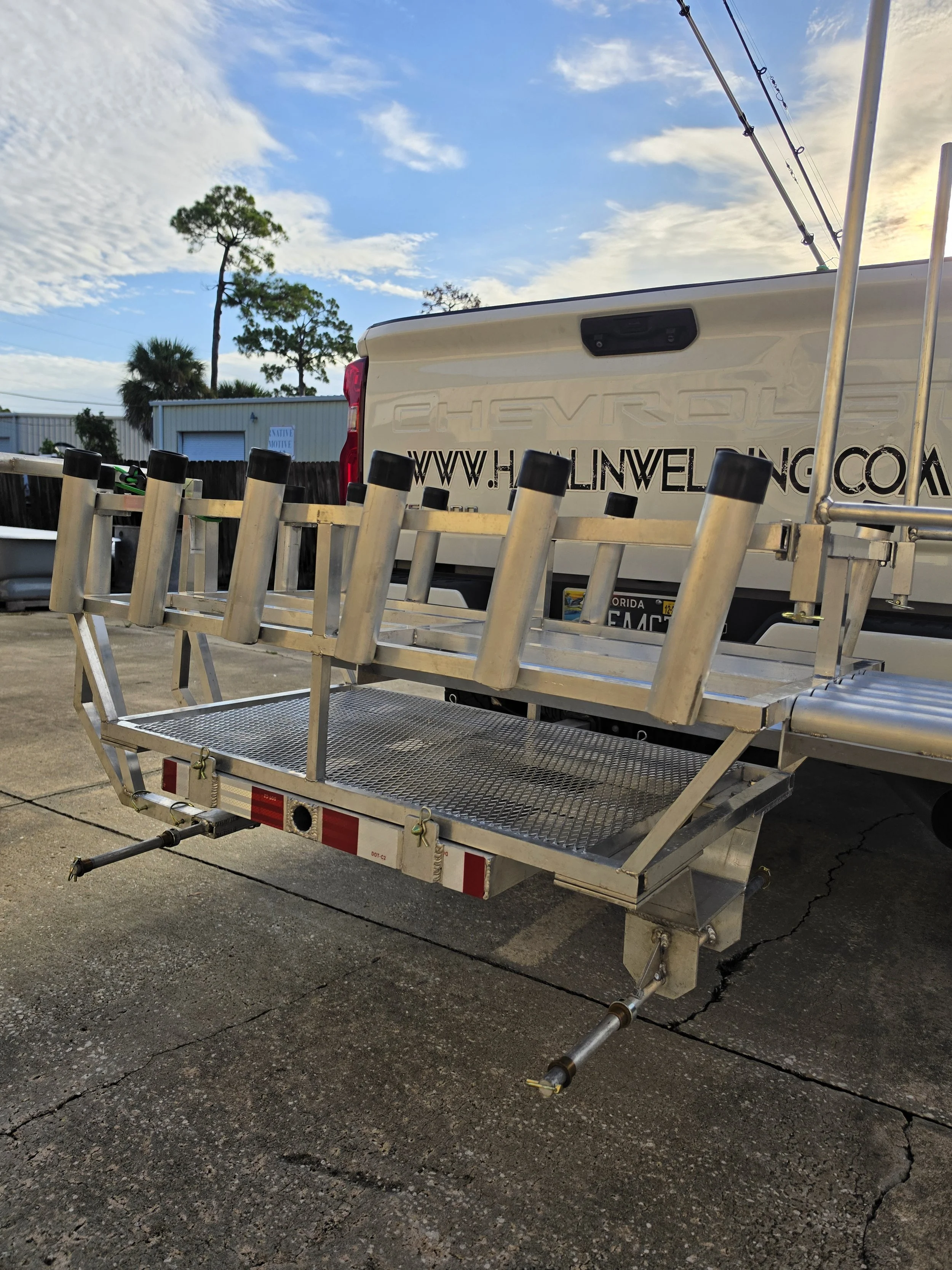 Hitch-mount receiver lifts the whole cart off the ground for the drive home. No lifting it into the bed. Trailer hitch mount receiver on a custom aluminum beach fishing cart