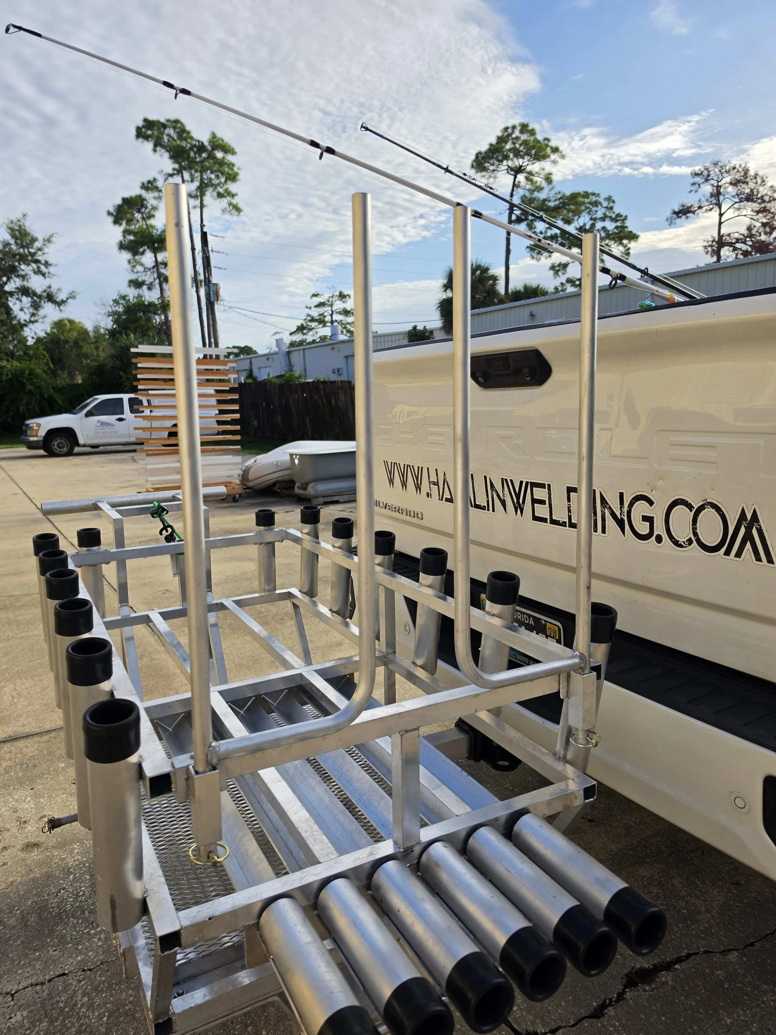 Chair arms mount to the frame and stay out of the way when you don't need them. Aluminum chair rack arms mounted to a custom surf fishing cart frame