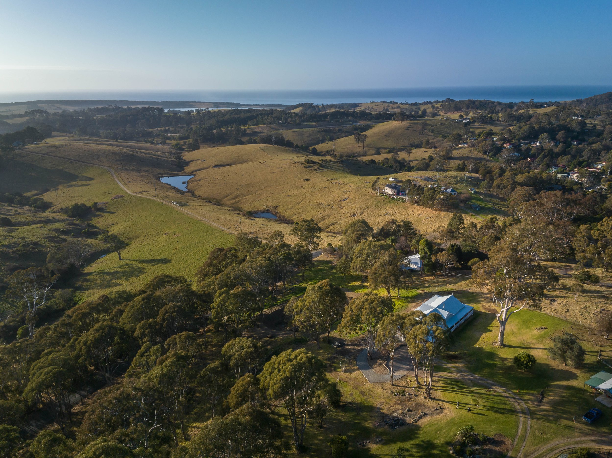 Aerial view of The Bryn with the ocean backdrop