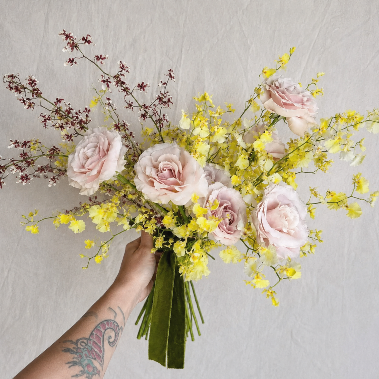 yellow oncidium orchid cream rose bridal bouquet moandcofloral park city florist