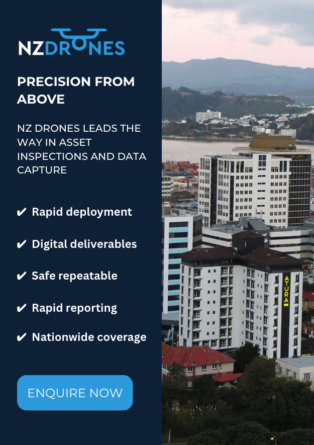 A wide-angle drone shot of a commercial building or infrastructure asset