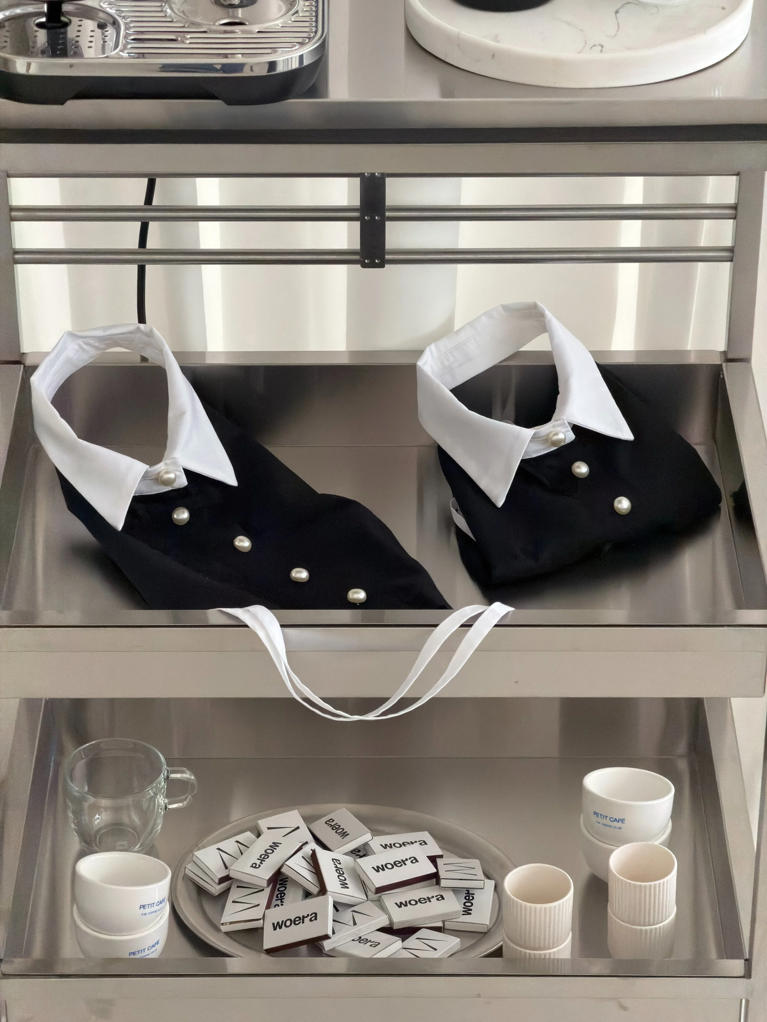 tuxedo is back but renewed | black with pearls.
