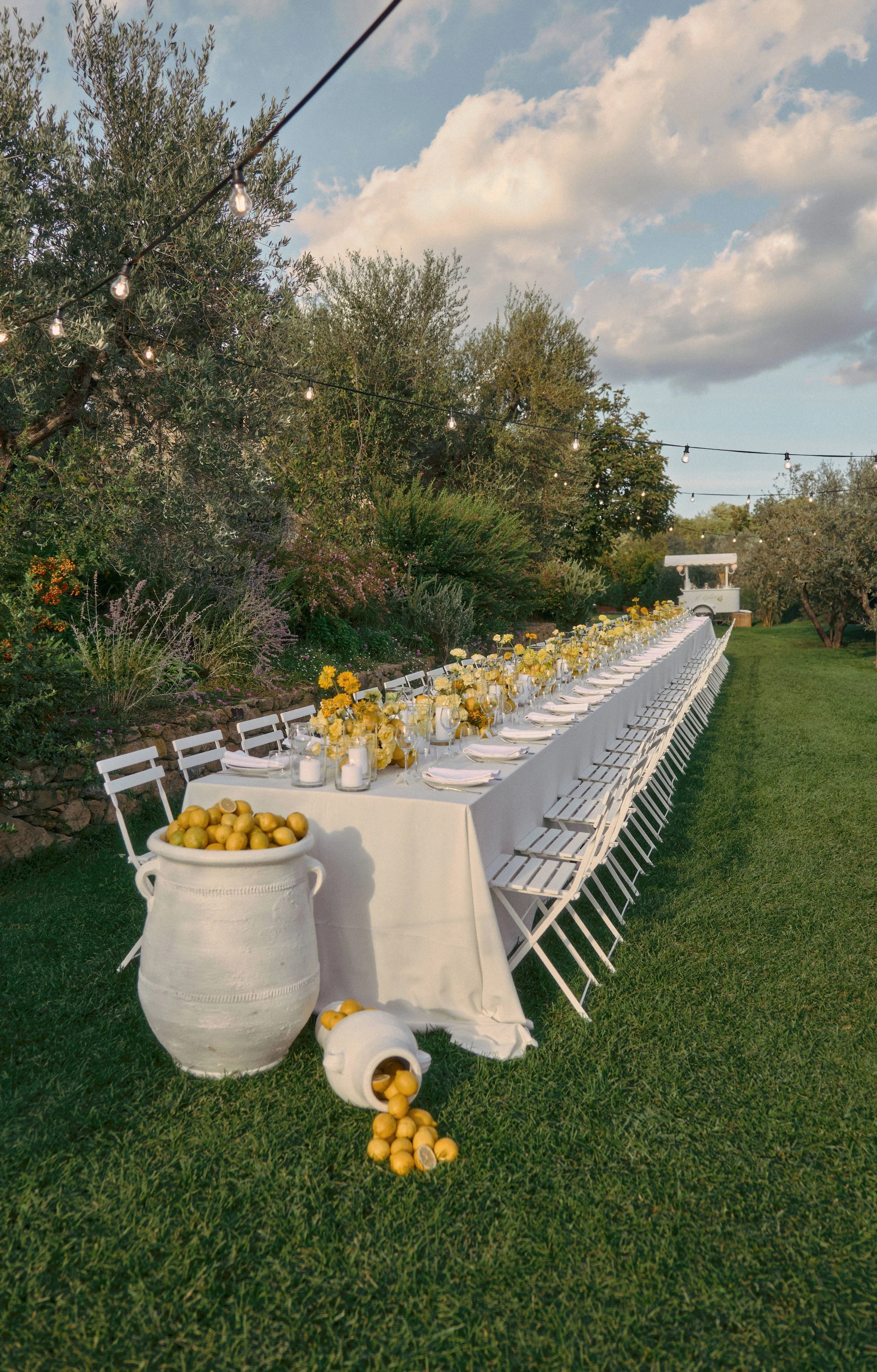 Outdoor Wedding Dinner with Yellow Florals and Lemons