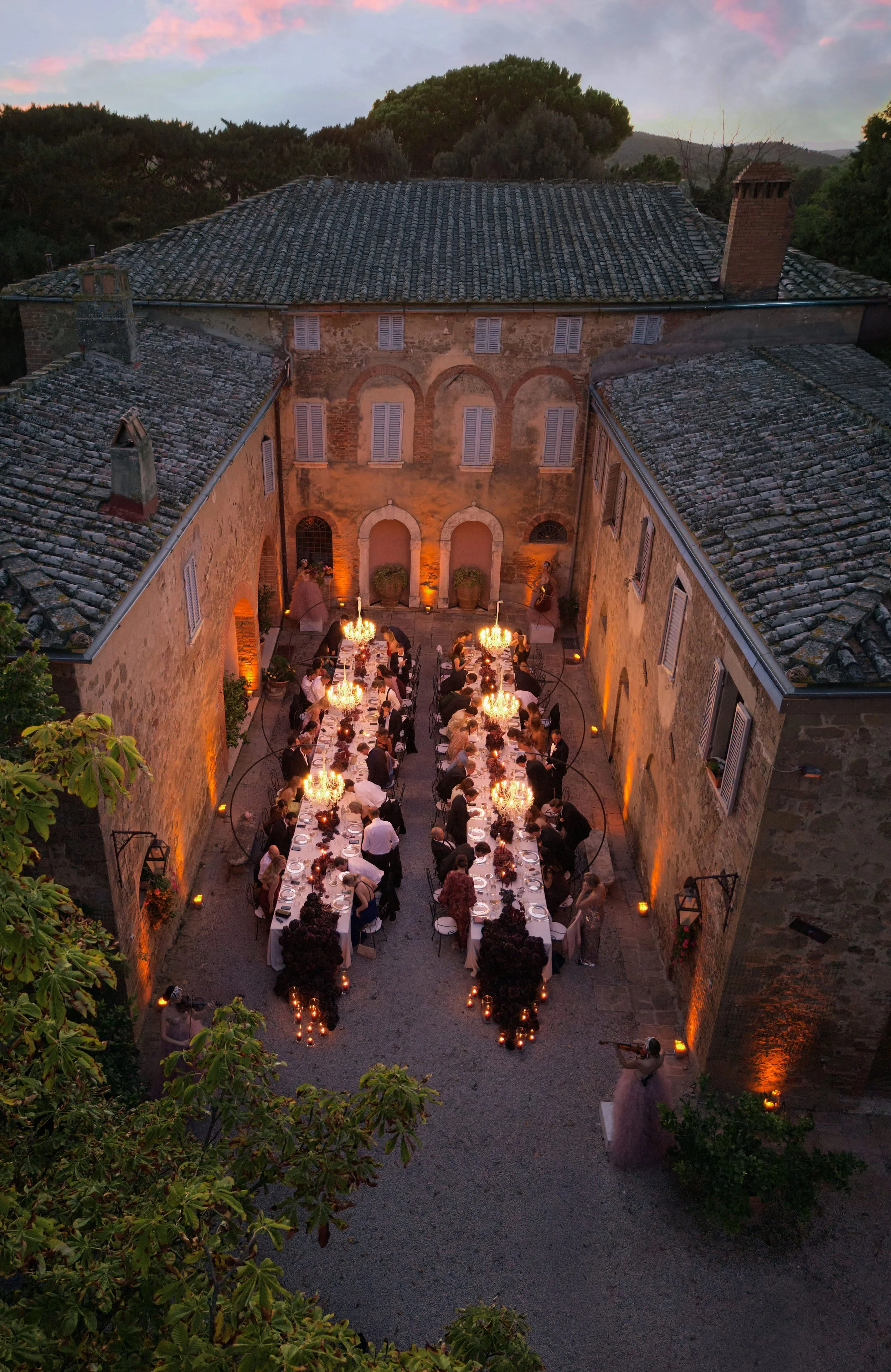 Wedding Reception with Chandeliers and Floral Tablescapes
