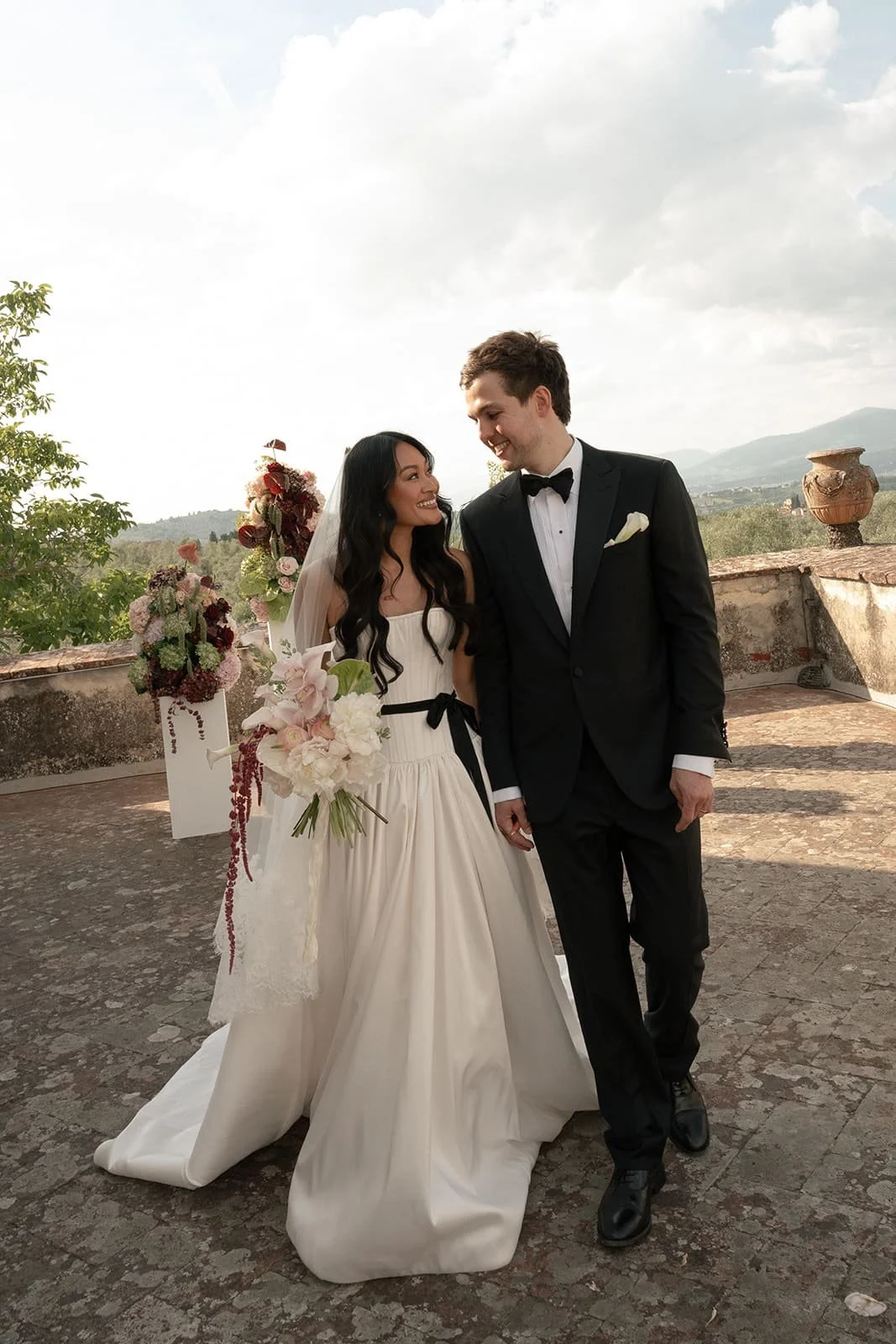 Newlyweds celebrating their wedding at Villa Medicea di Lilliano overlooking Florence