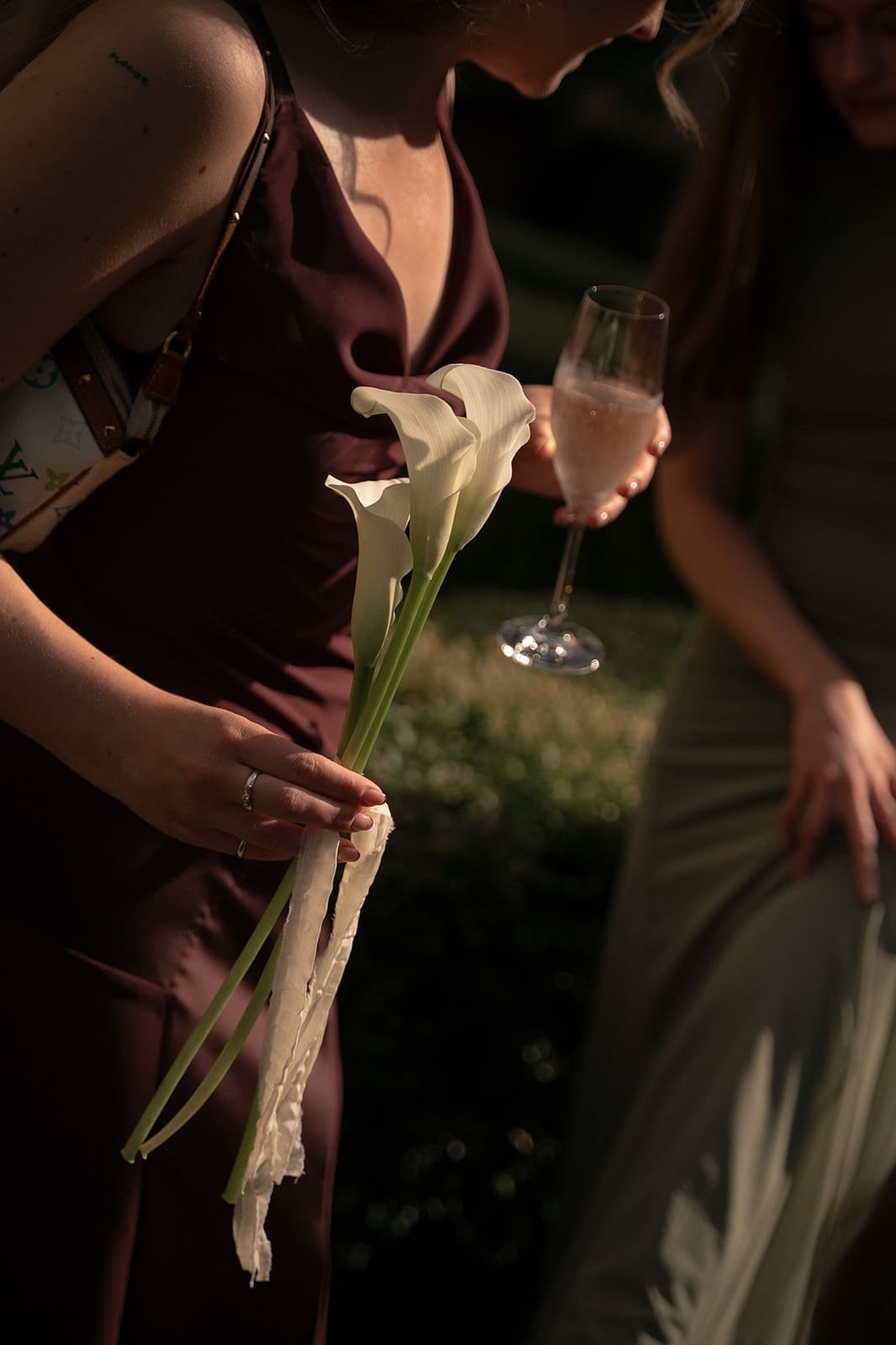 Single stem cala lilies for bridesmaids bouquet and burgundy dress
