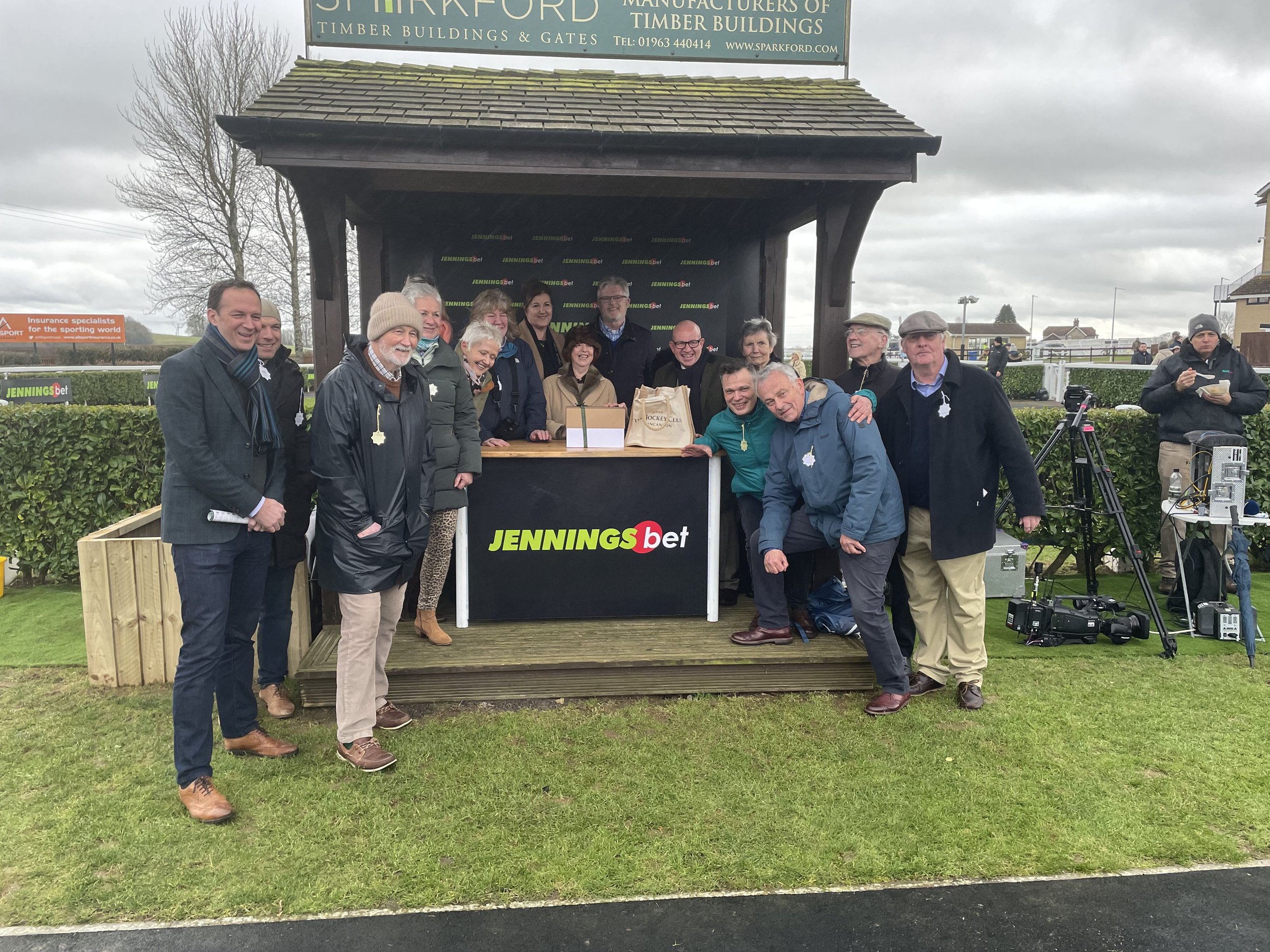 Owners celebrating Lime Avenue's win