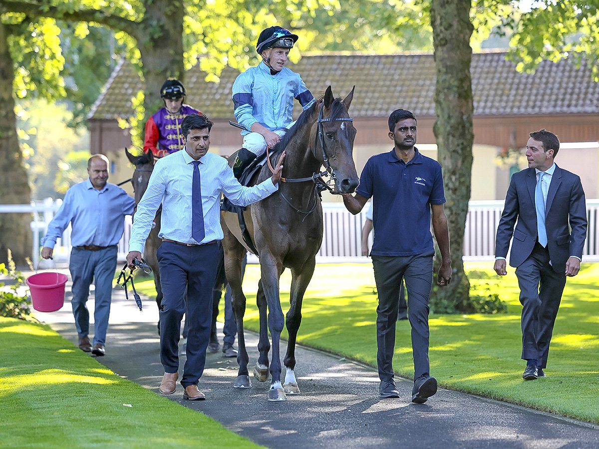Ancestor being led in after winning