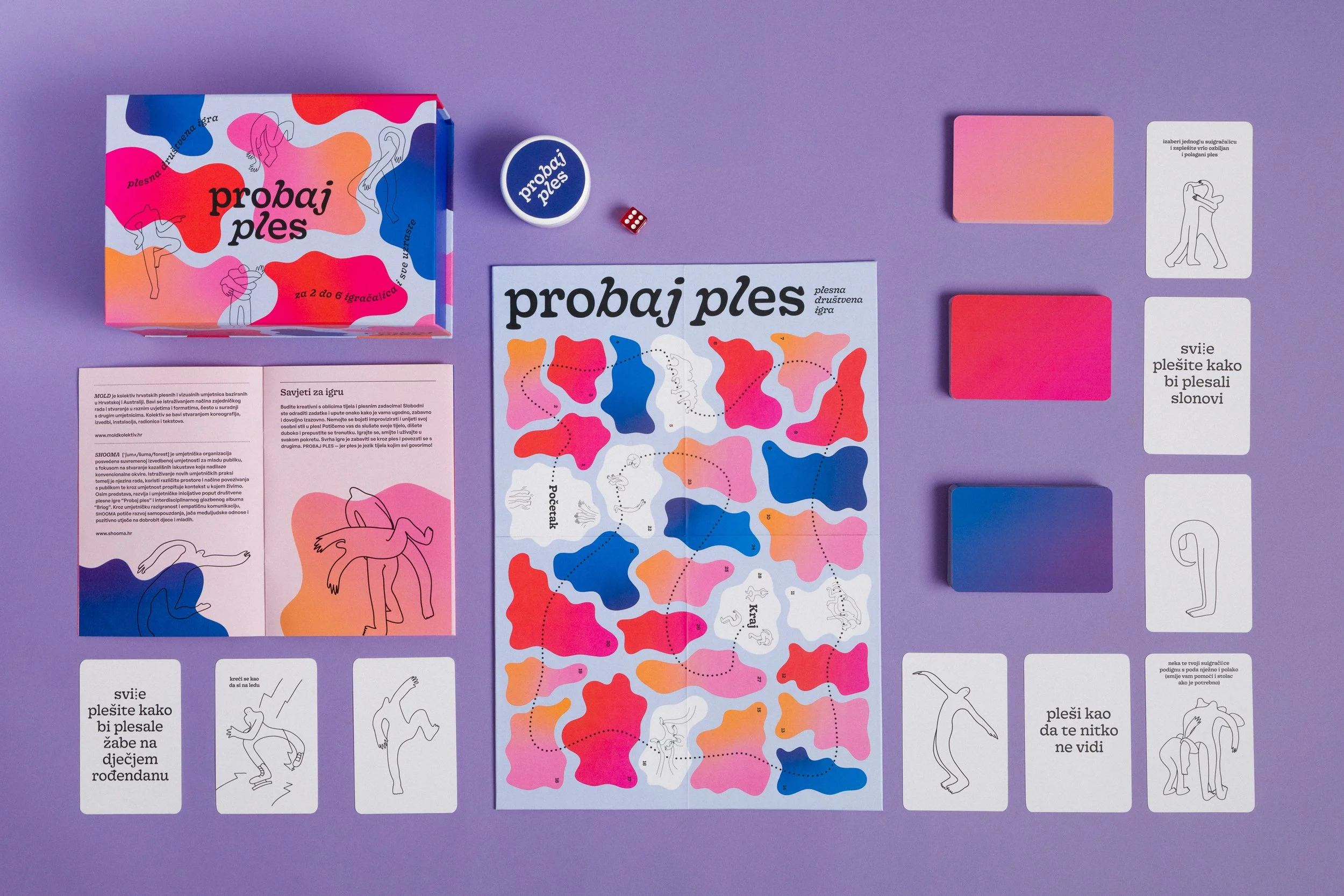 Fotografija društvene igre Probaj ples. Igru je izradila Shooma, dizajnirala Kuna zlatica, i fotografirala Doris Fatur.