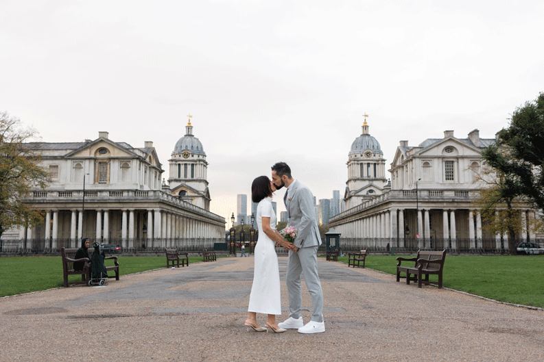 Groom and bride portrait near Queen house and with the Old Royal Naval College in the background