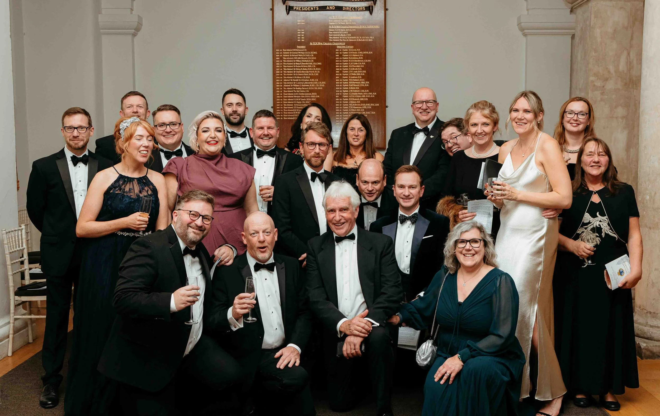 Black tie event group photo at the Painted Hall Greenwich