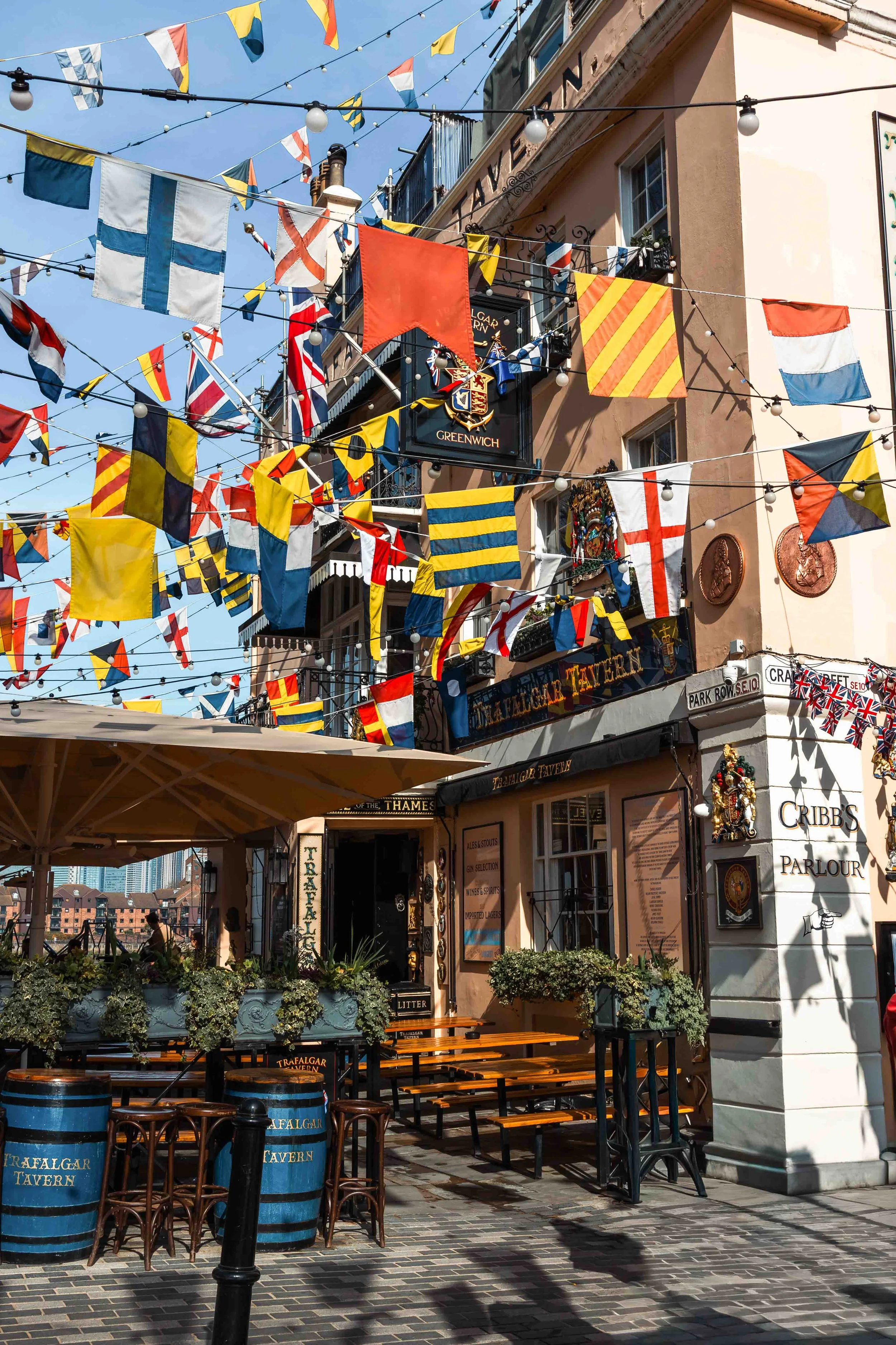 Colourful flags decorating streets near Trafalgar Tavern Greenwich