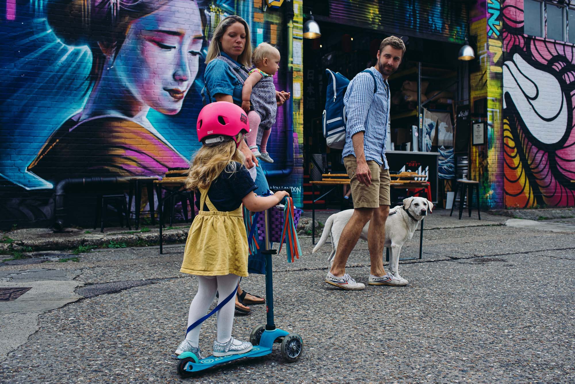 girl-scooter-dad-dog-portrait-family-photographer-london-dulwich-unposed-family-photography.jpg