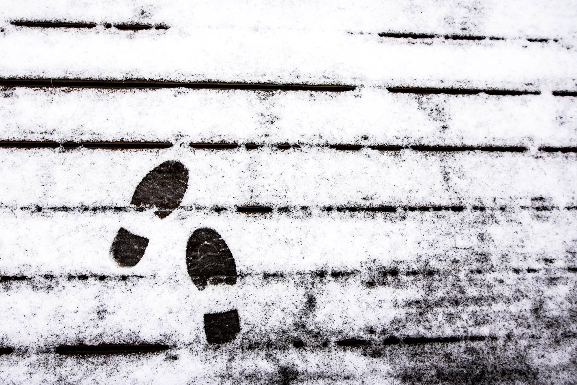 footsteps-in-snow-family-documentary-photography-london-brighton-newborn-baby-family-photography-near-me.jpg