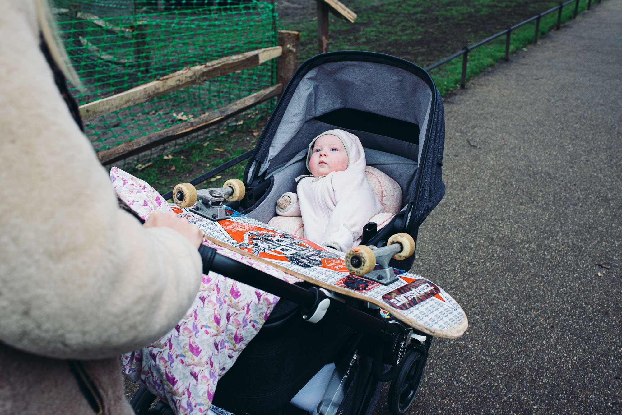 newborn-baby-pram-family-photoshoot-london-belgravia-family-photographer-skateboard-on-pram.jpg
