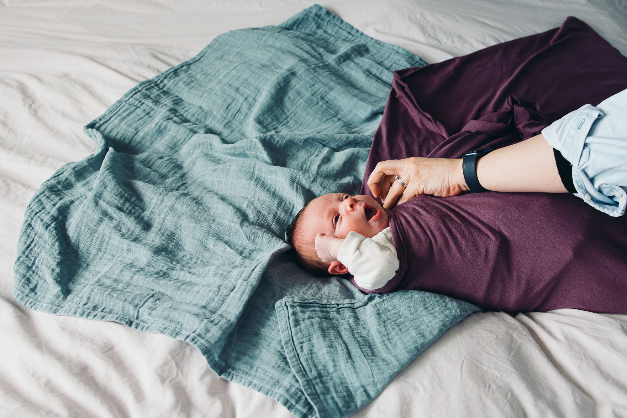 at-home-newborn-photo-shoot-natural-baby-girl-swaddling-watford-newborn-photographer.jpg