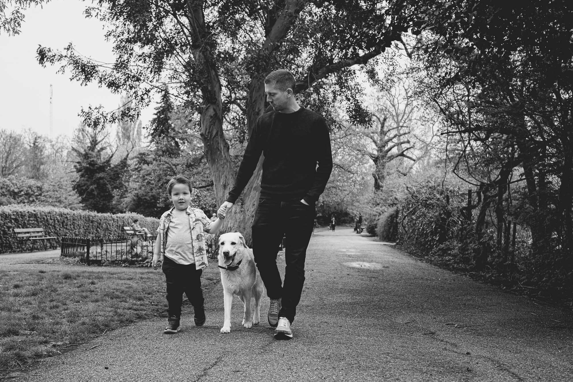 dad-dog-son-walking-peckham-rye-park-london-unposed-natural-family-photography.jpg