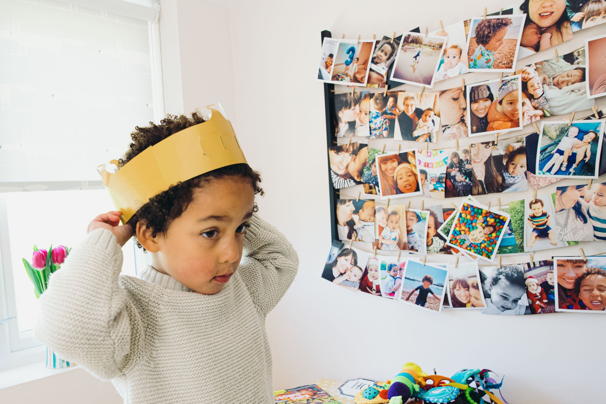 boy-wearing-paper-crown-in-kitchen-at-home-newborn-family-photography-brighton-worthing-horsham-lewes-hove.jpg