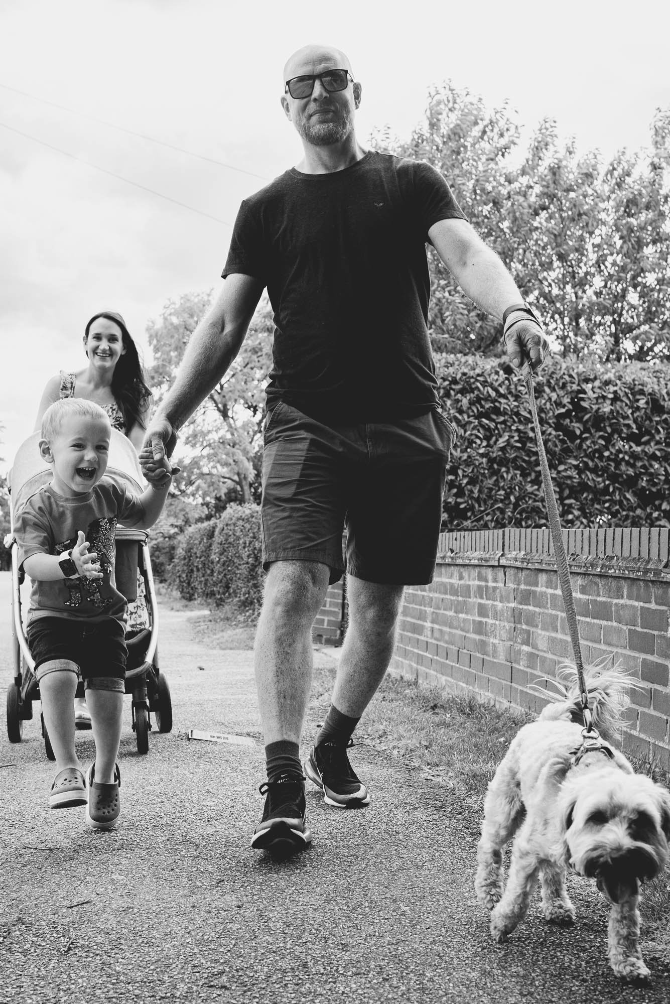 brighton-family-photographer-hove-sussex-family-walking-dog-natural-candid-family-portraits.jpg