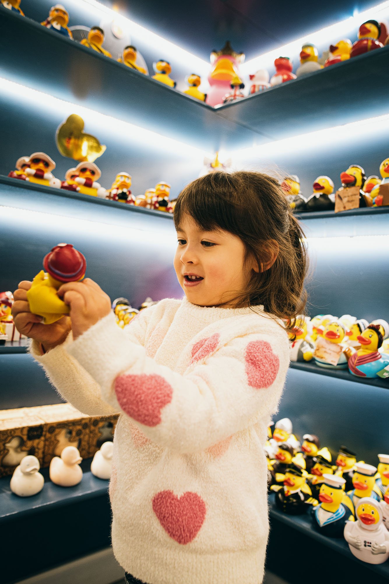 girl-rubber-duck-store-brighton-lanes-unposed-documentary-family-photography-sussex-hove-worthing-lancing-lewes-eastbourne.jpg