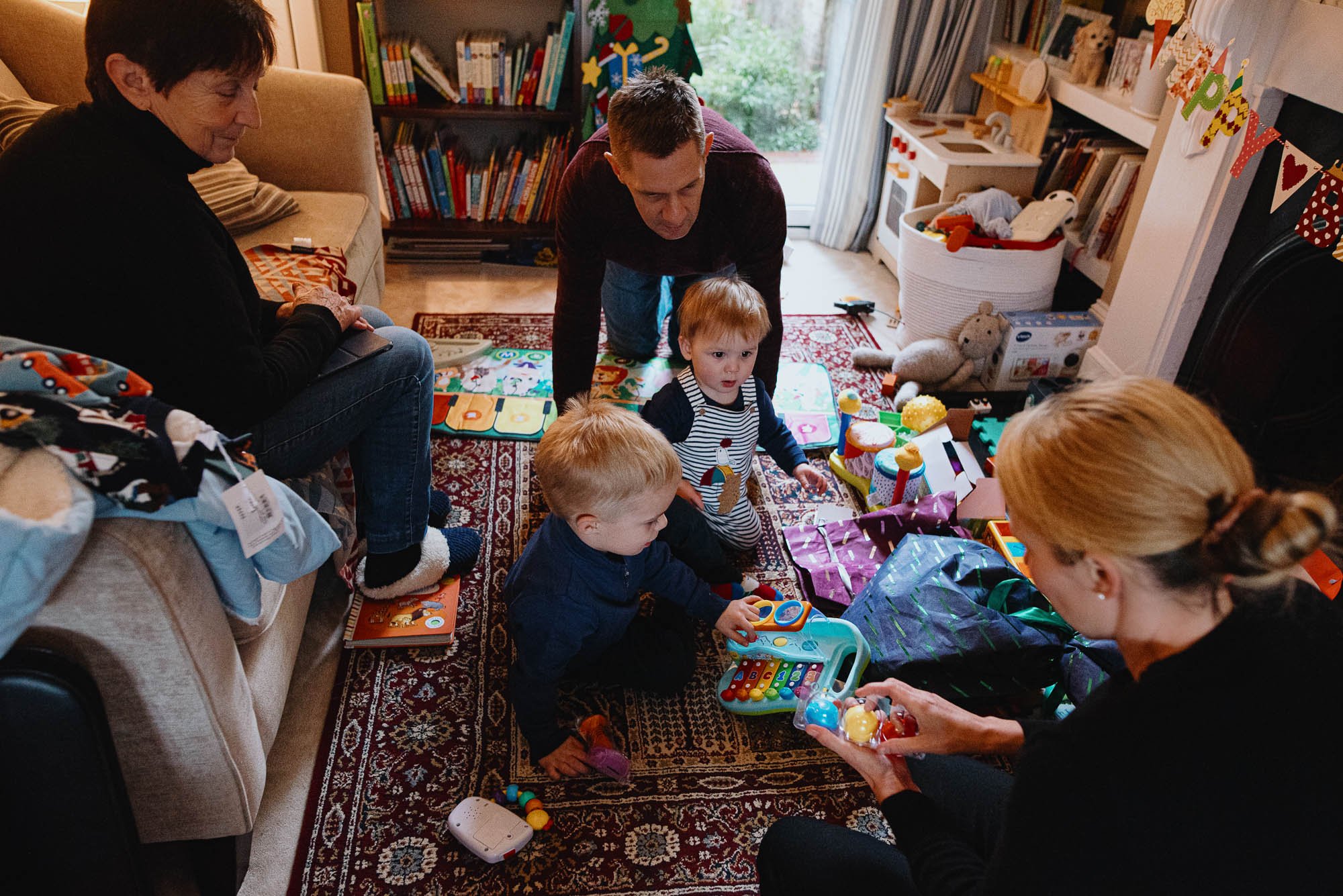birthday-at-home-family-documentary-photography-unwrapping-presents-dulwich-london-family-photoshoot.jpg