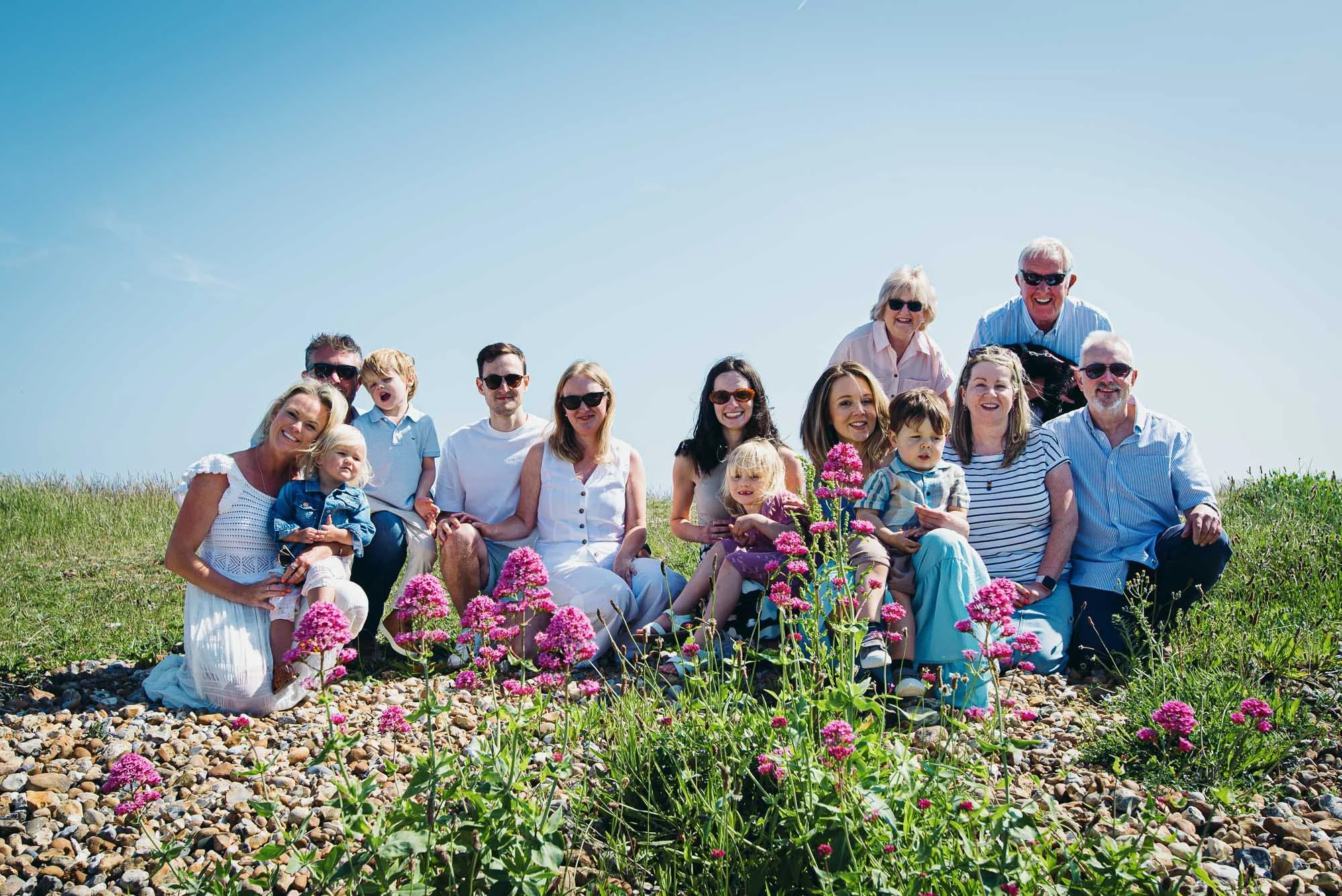 Angemering extended family photo session on the beach, family portrait on a Summer day.