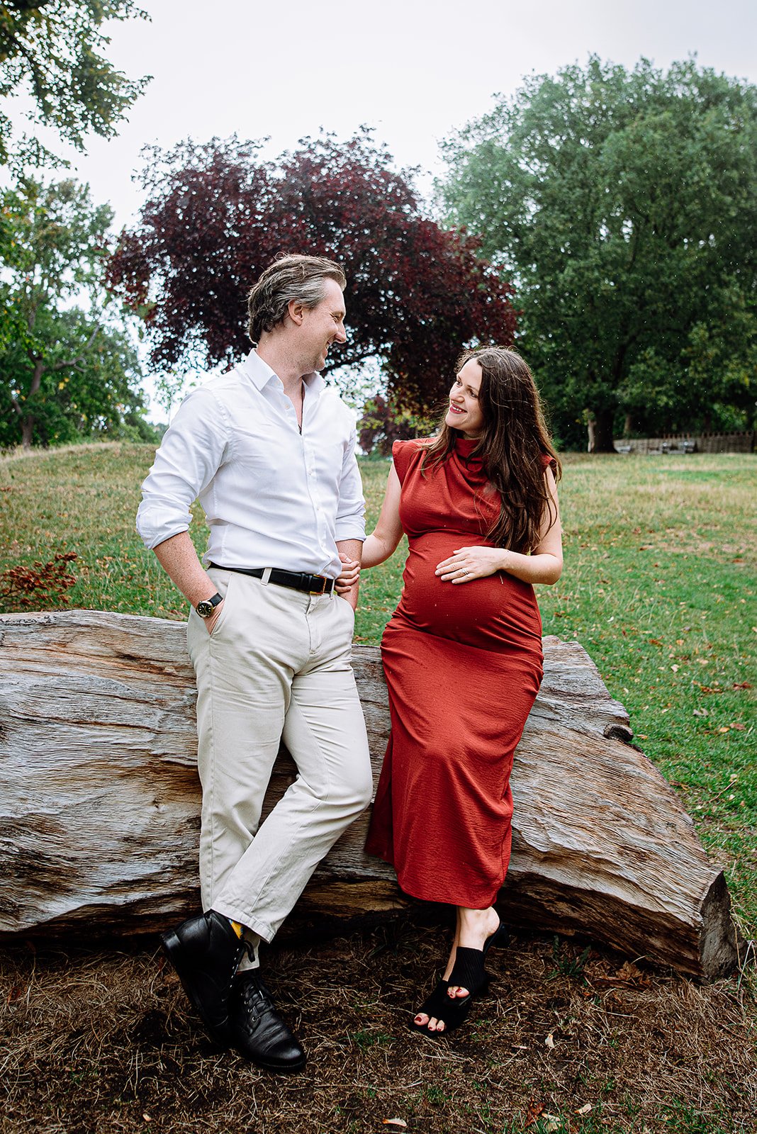 West Sussex maternity photoshoot outdoors, in park. Award-winning maternity photography in Worthing. Couple.
