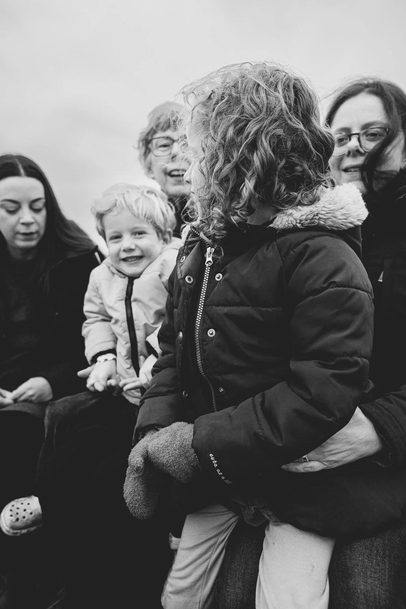 Family lifestyle portrait in black and white, unposed, by award-winning Chichester family photographer working all across West Sussex.