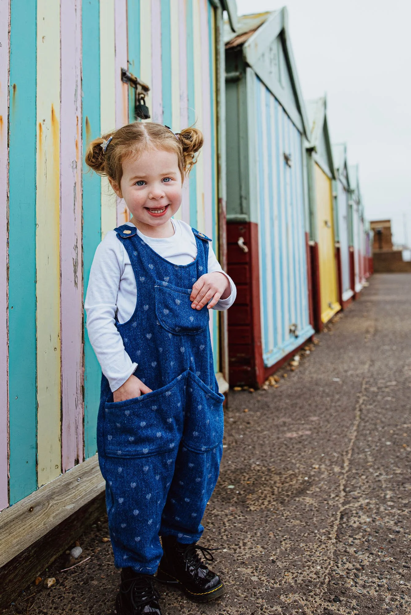 hove-candid-family-photographer-girlbeach-huts-seafront-brighton-hove-sussex.jpg