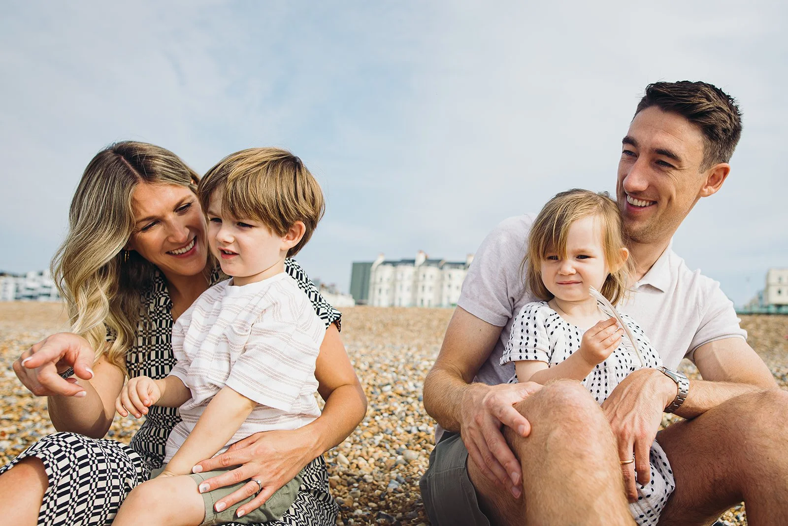 Candid natural family portraits at Brighton and Hove beach. Unposed award-winning family photography in Brighton, Hove, Worthing, Chichester and across Sussex.