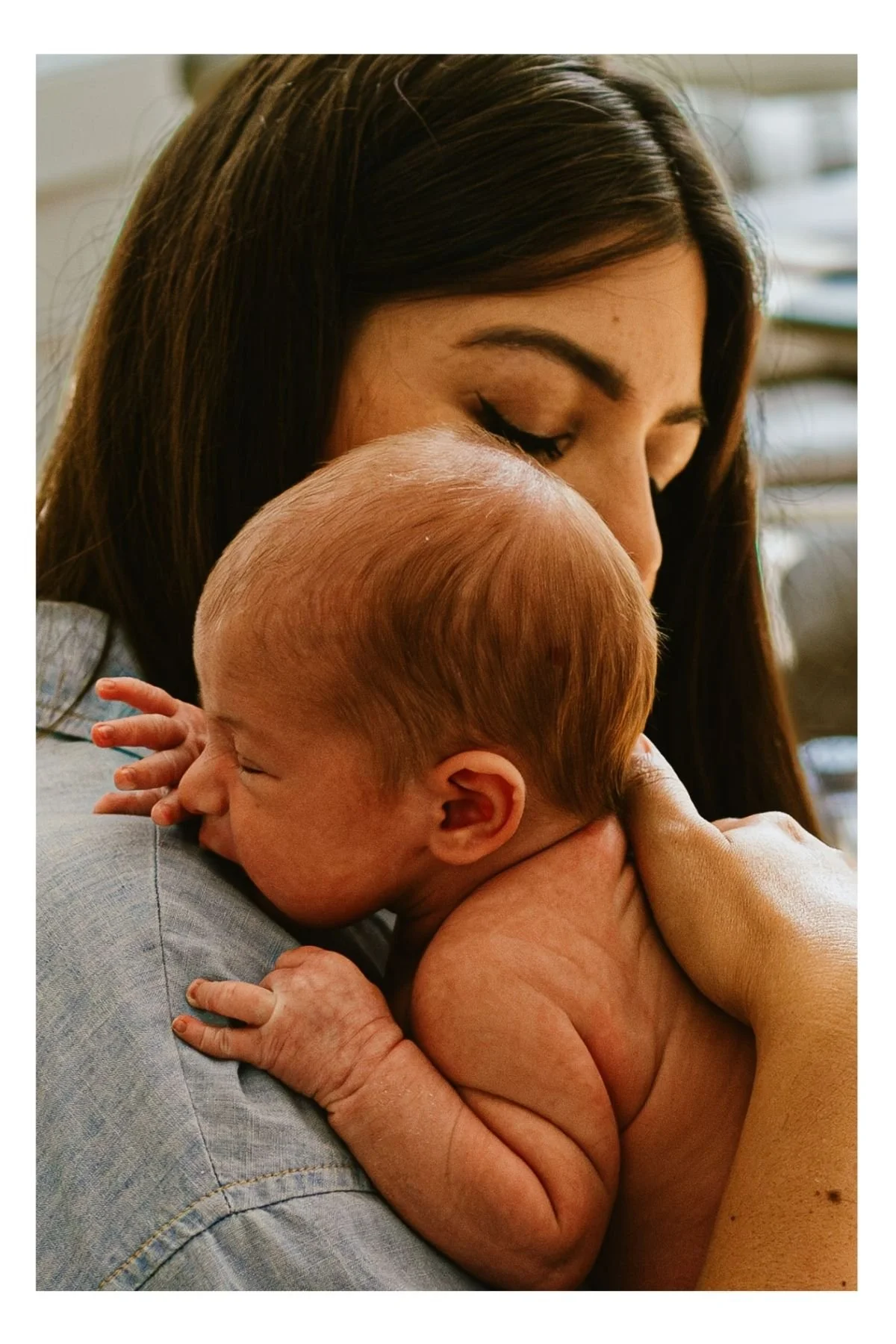 Timeless luxury mother and newborn baby portrait taken by Greenwich newborn baby photographer.