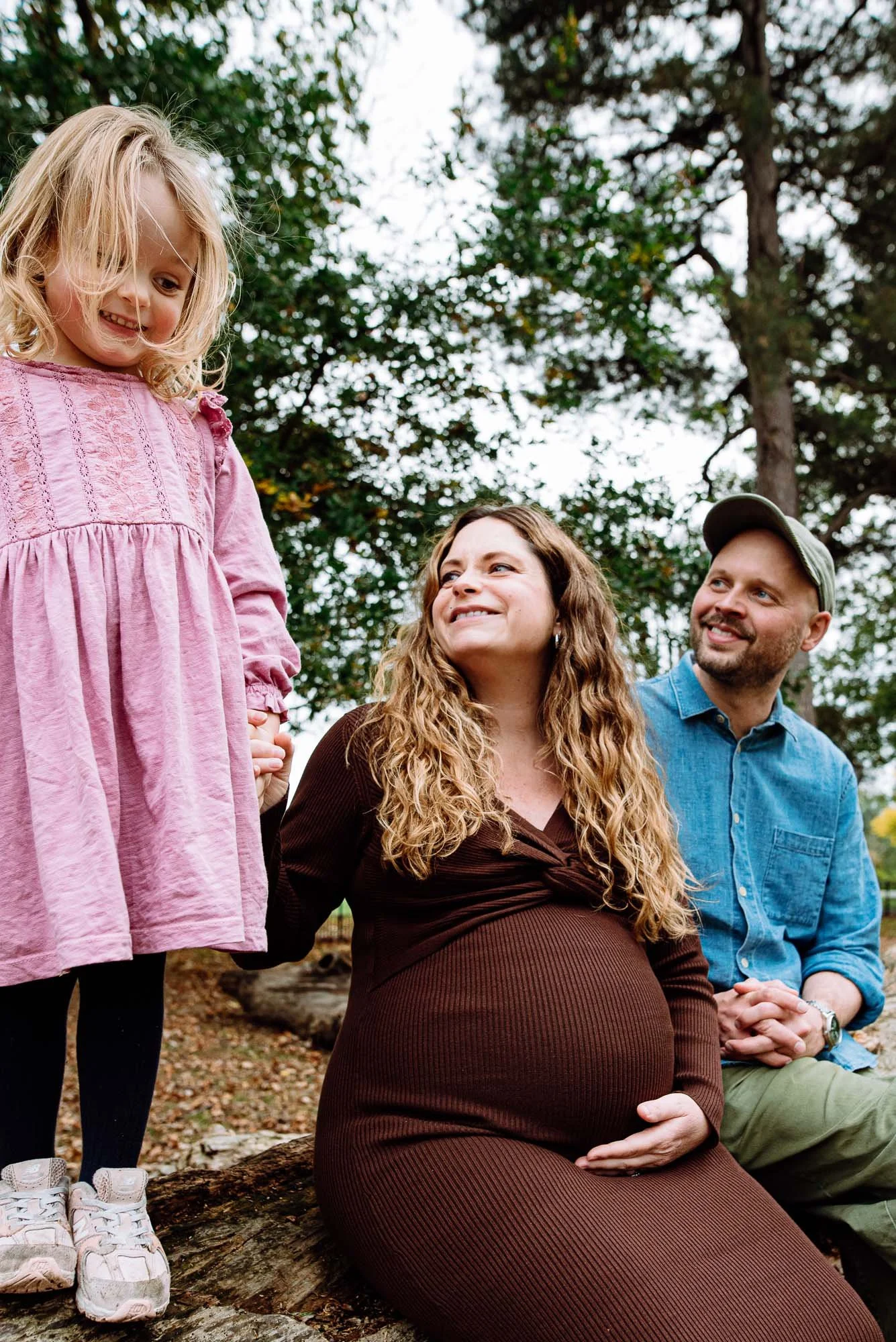 Tooting family photography, candid, natural portrait of family, mother pregnant with second child.