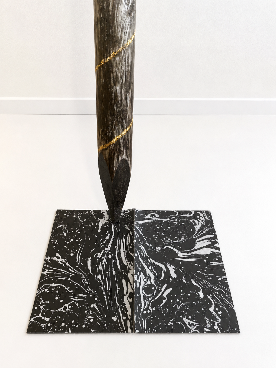 THE MARBLING PENCIL, ( after queens of the circulating library ) 2026
found wood branch, graphite, gold leaf, marbling paper, silver ink, 180 high x 45 x 35 cm
