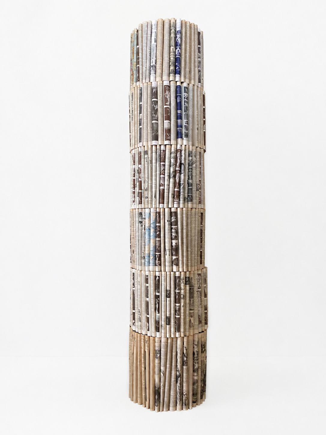 Pillar IV  2026
hand folded antique encyclopedias, wood, varnish, 
200 x 40 cm diameter
