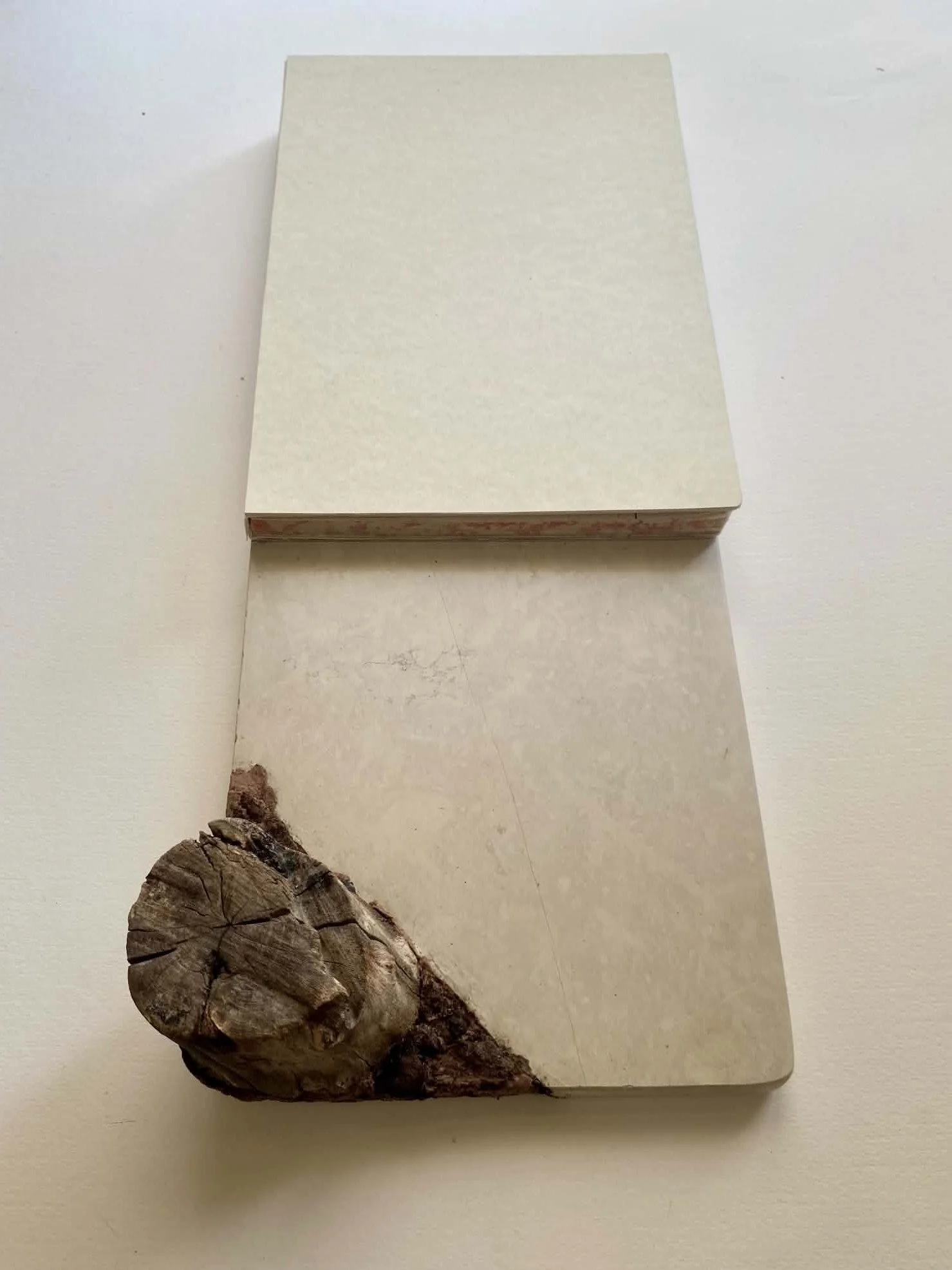 
''Poet’s Notebook – Between Marble & Marbling'', 2026. Handcrafted notebook, marble, found wooden branch, marbled paper, and clay.
30 × 15 × 6 cm.
