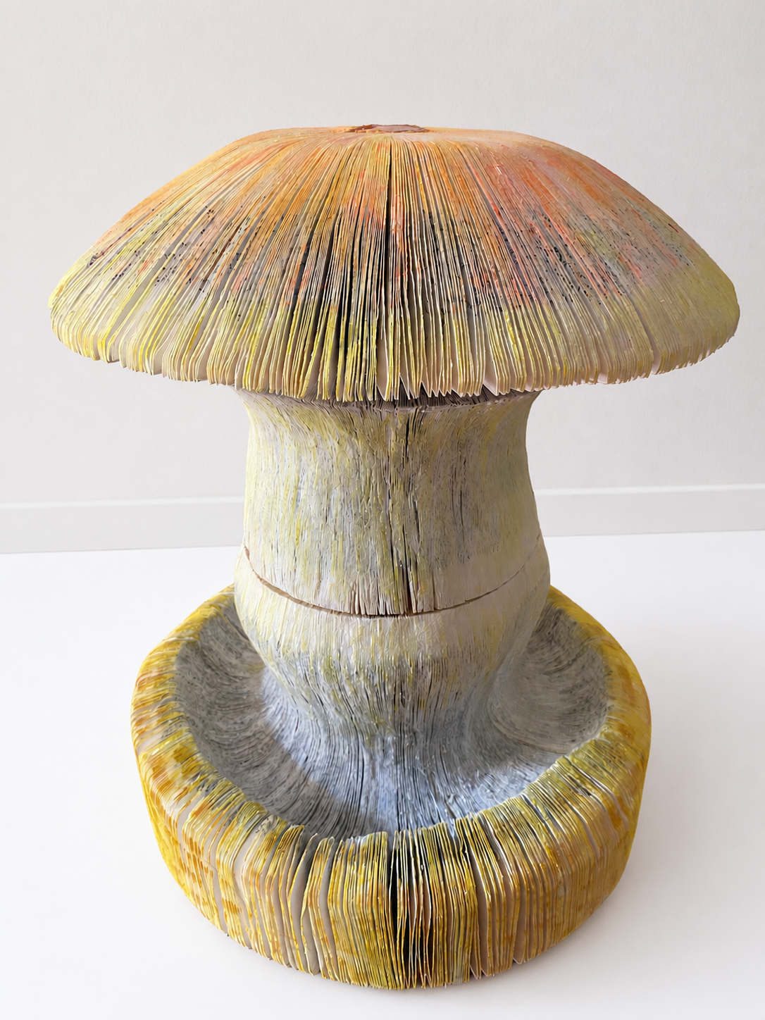 THE FUTURE IS FUNGAL ( Orange bonnet versus slipperycap ) 
2023
Hand crafted , altered & sanded books , pastel powder 
45 cm hight x 35 cm diameter 