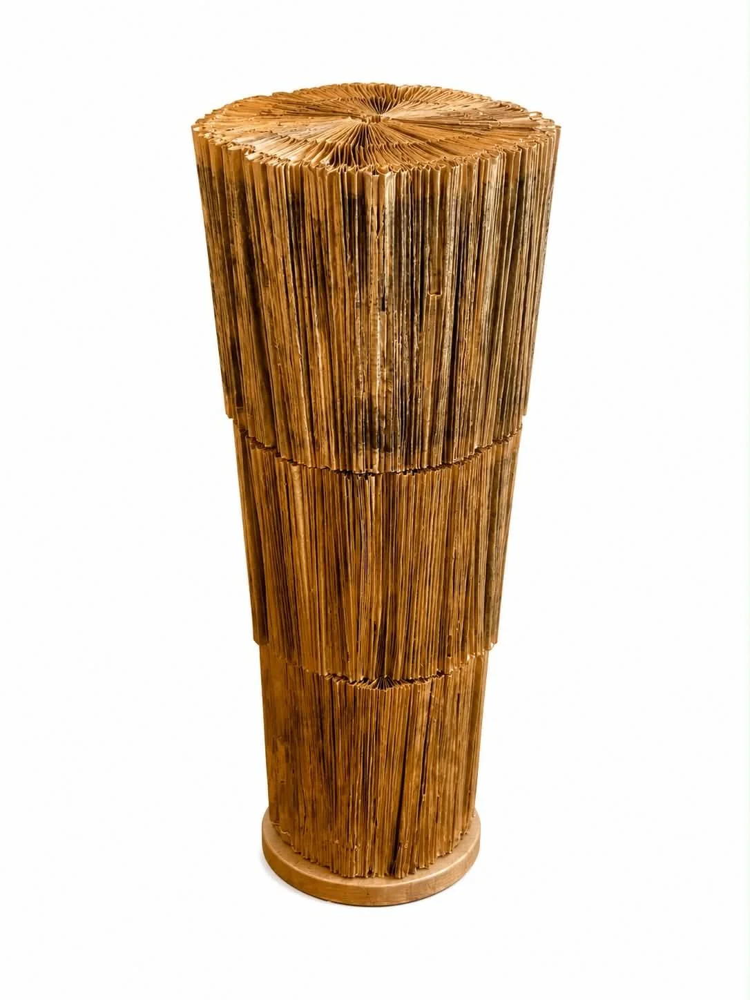 Pillar III 2026
distorted & hand folded books, wood, gold leaf, varnish, 
110 x 30 cm diameter