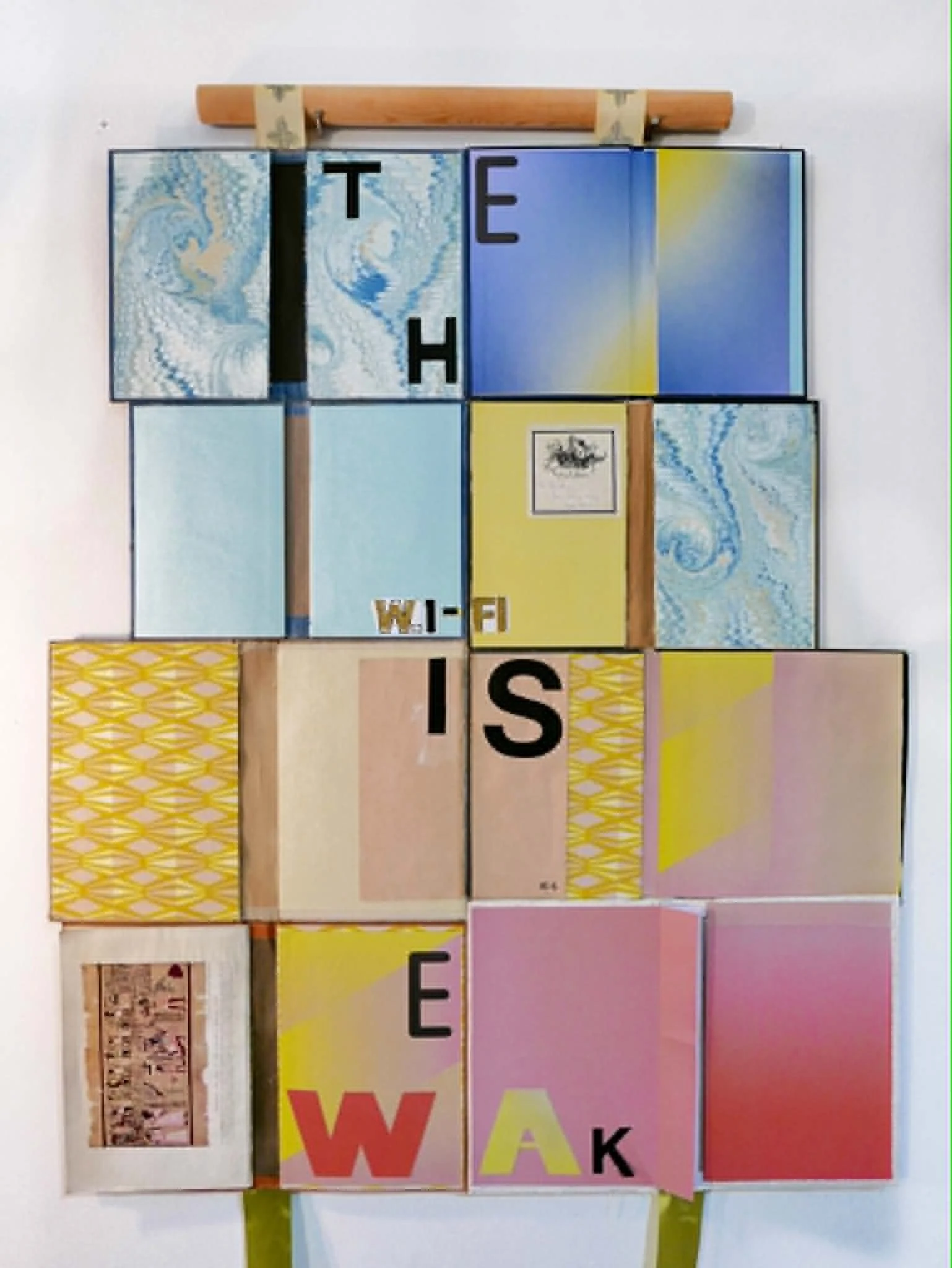 THE WIFI IS WEAK (i)  - BOOKSCAPE I
2017 
hardbacks Belgian & English hand-bound , screen-printing, vinyl letters, stardust, handprinted ribbons, wood, 90x65cm , ©mitrentse courtesy private collection Athens
