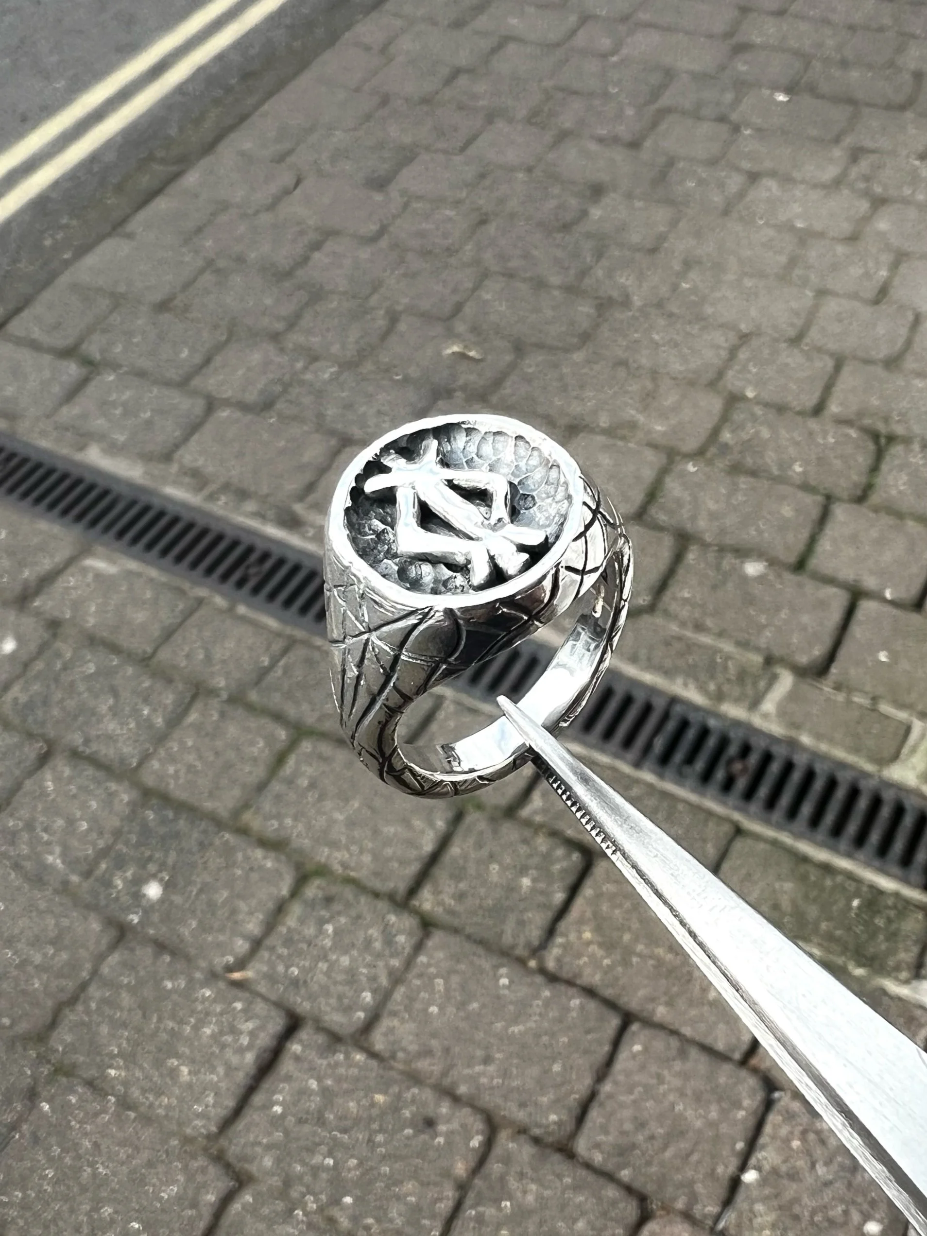 A bespoke Nordic rune sterling silver bark textured signet ring, made by J.T.R.Jewellery
