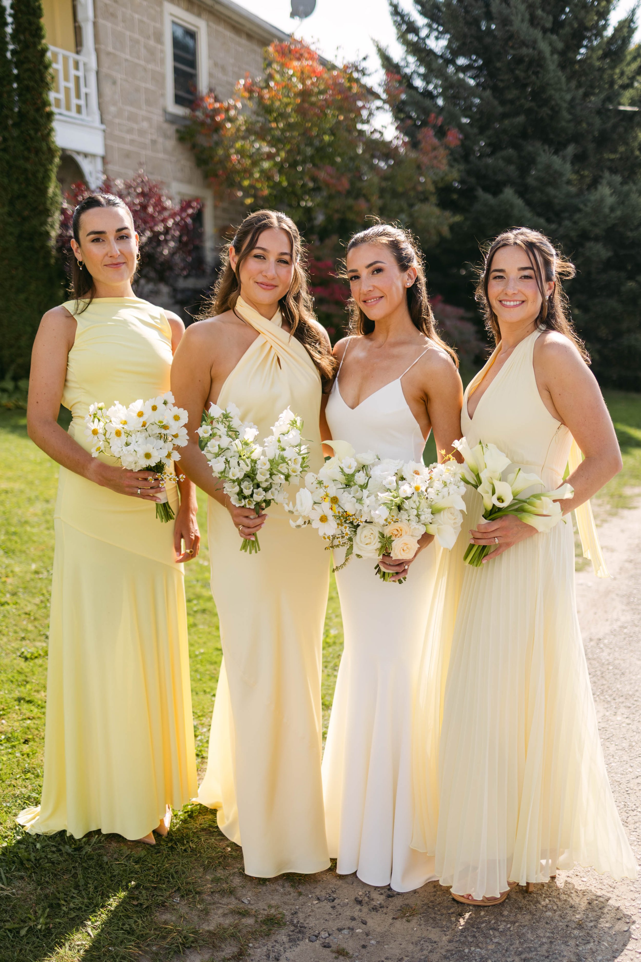 Butter yellow bridesmaid dresses mismatched bridesmaid bouquets.jpg