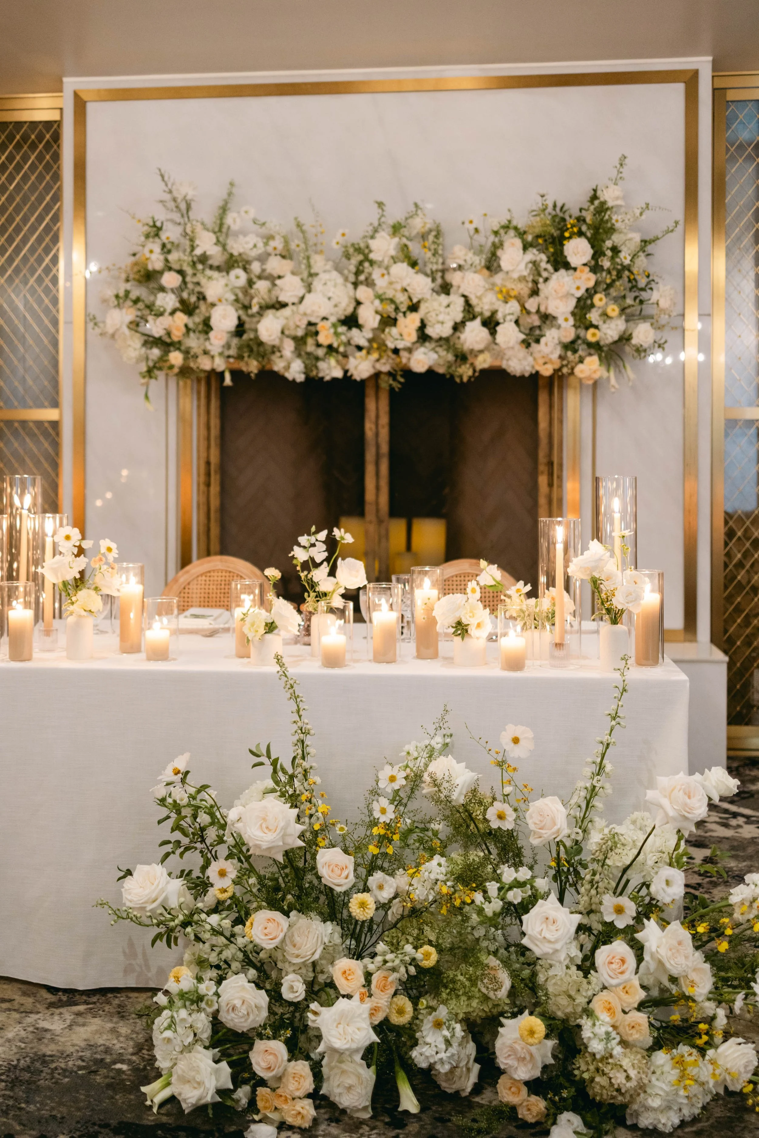 Elora Mill Sweetheart Table Whiteand Yellow Flowers.jpg