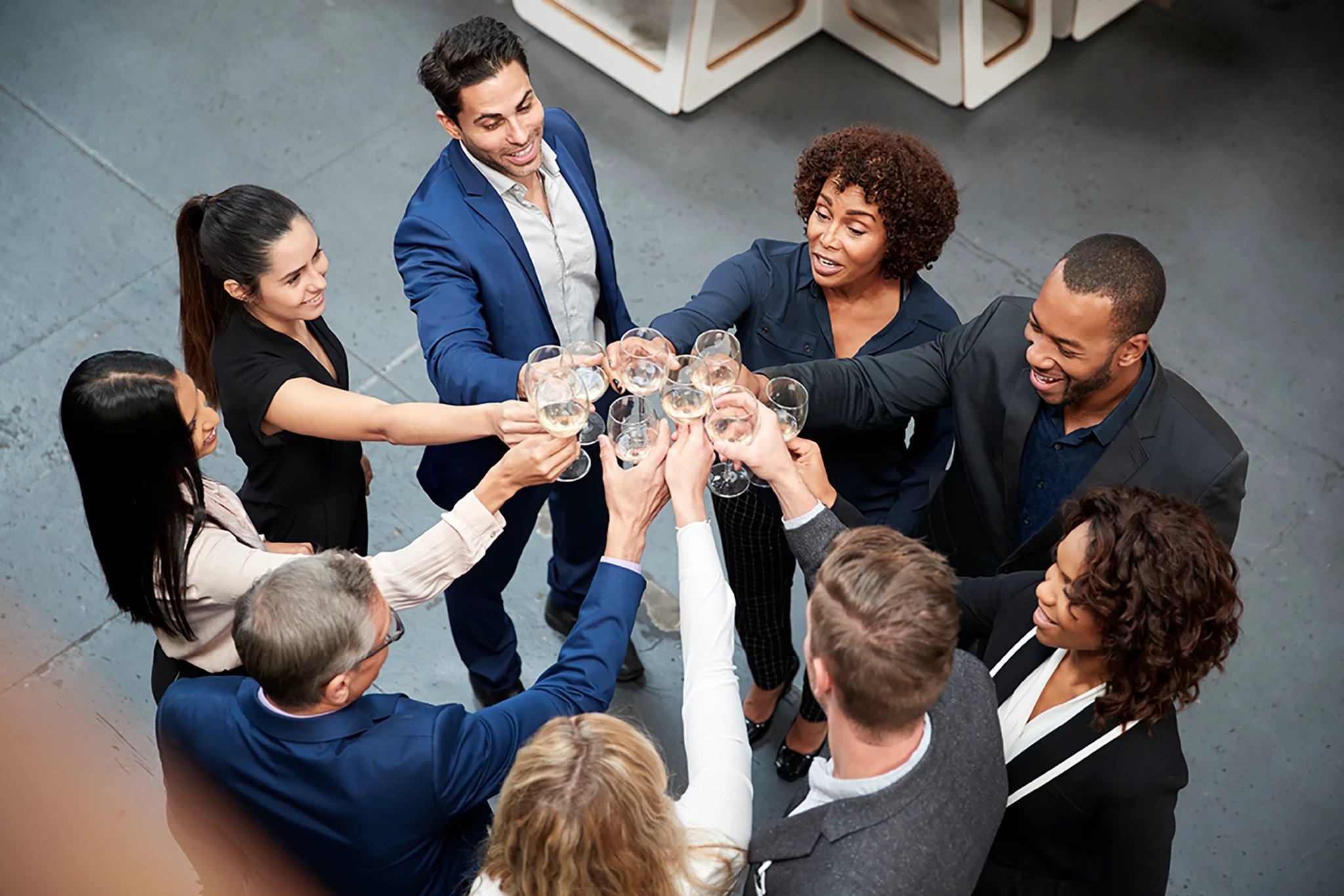 overhead-shot-of-business-team-celebrating-5KFSWBH.jpeg