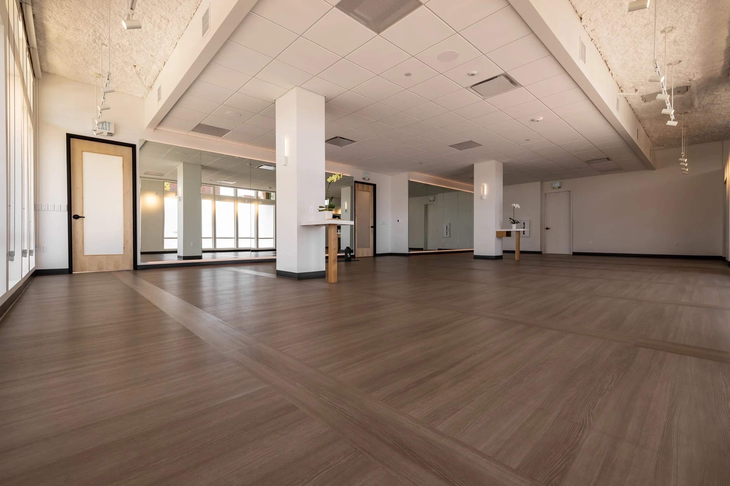 Studio Space with mirrors and natural light from frosted windows