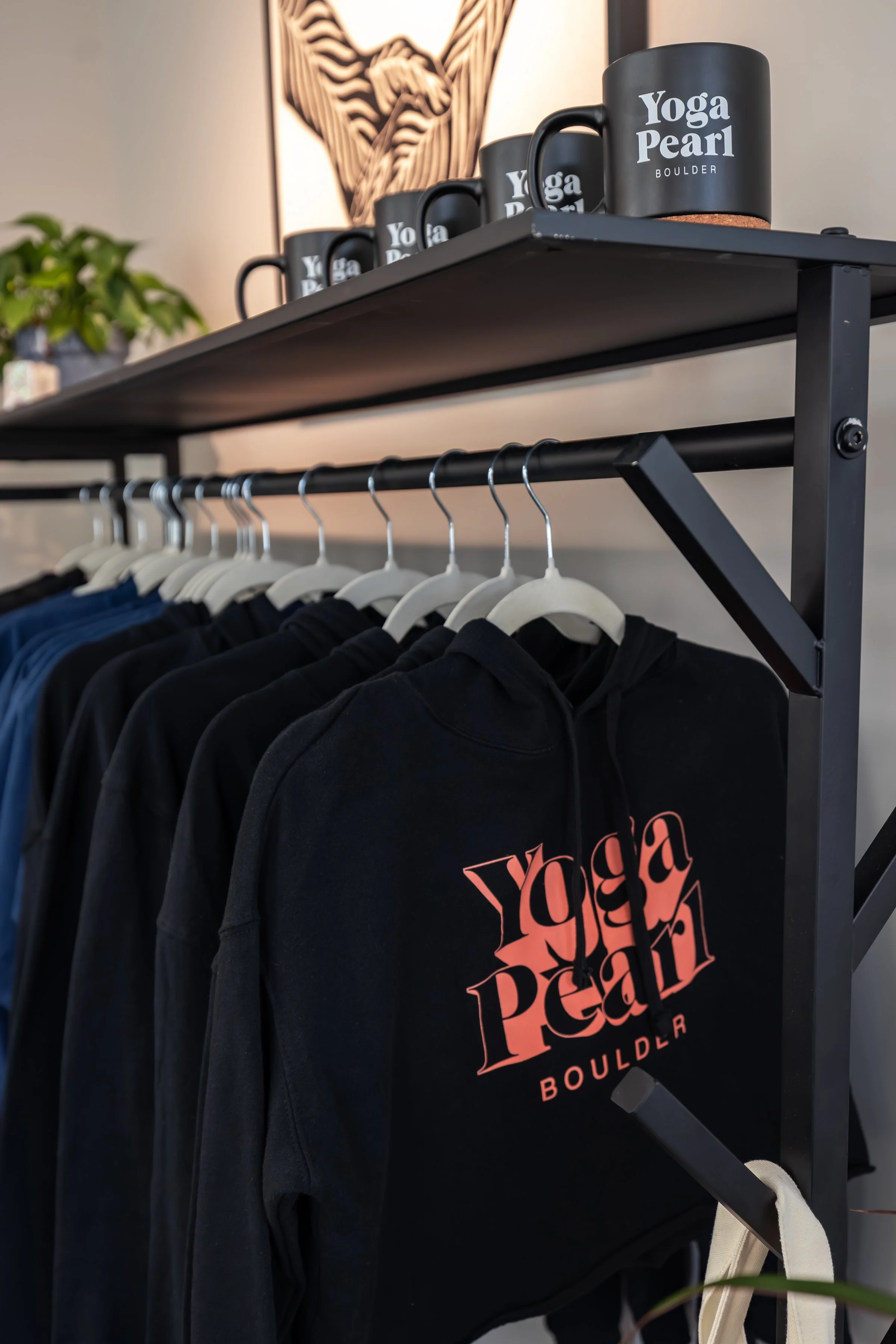 Branded merch cups and sweatshirts