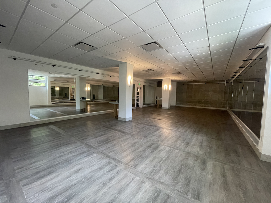Empty studio with mirrors and natural light