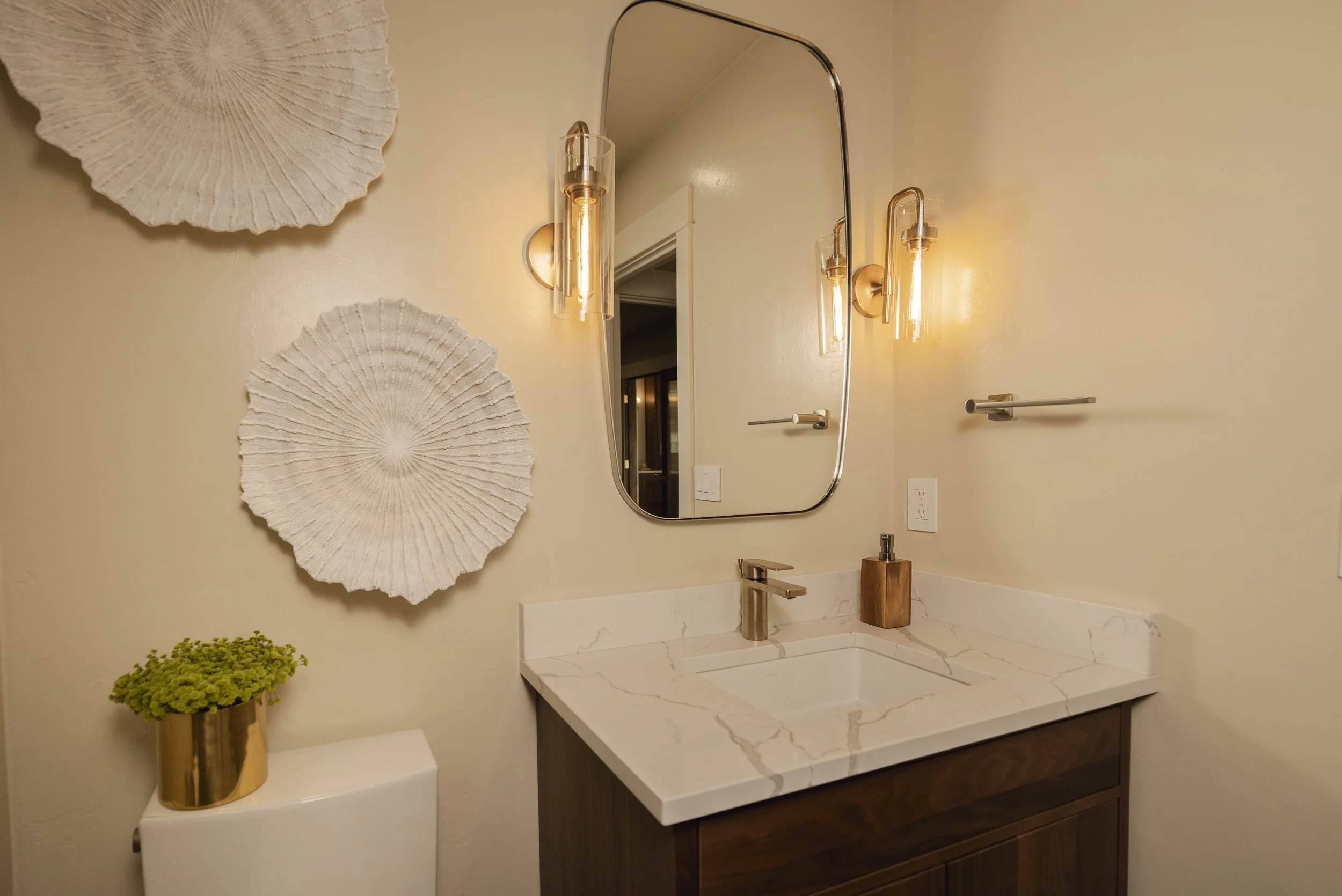 CUSTOM WALNUT VANITY WITH VEINED QUARTZ COUNTERTOP